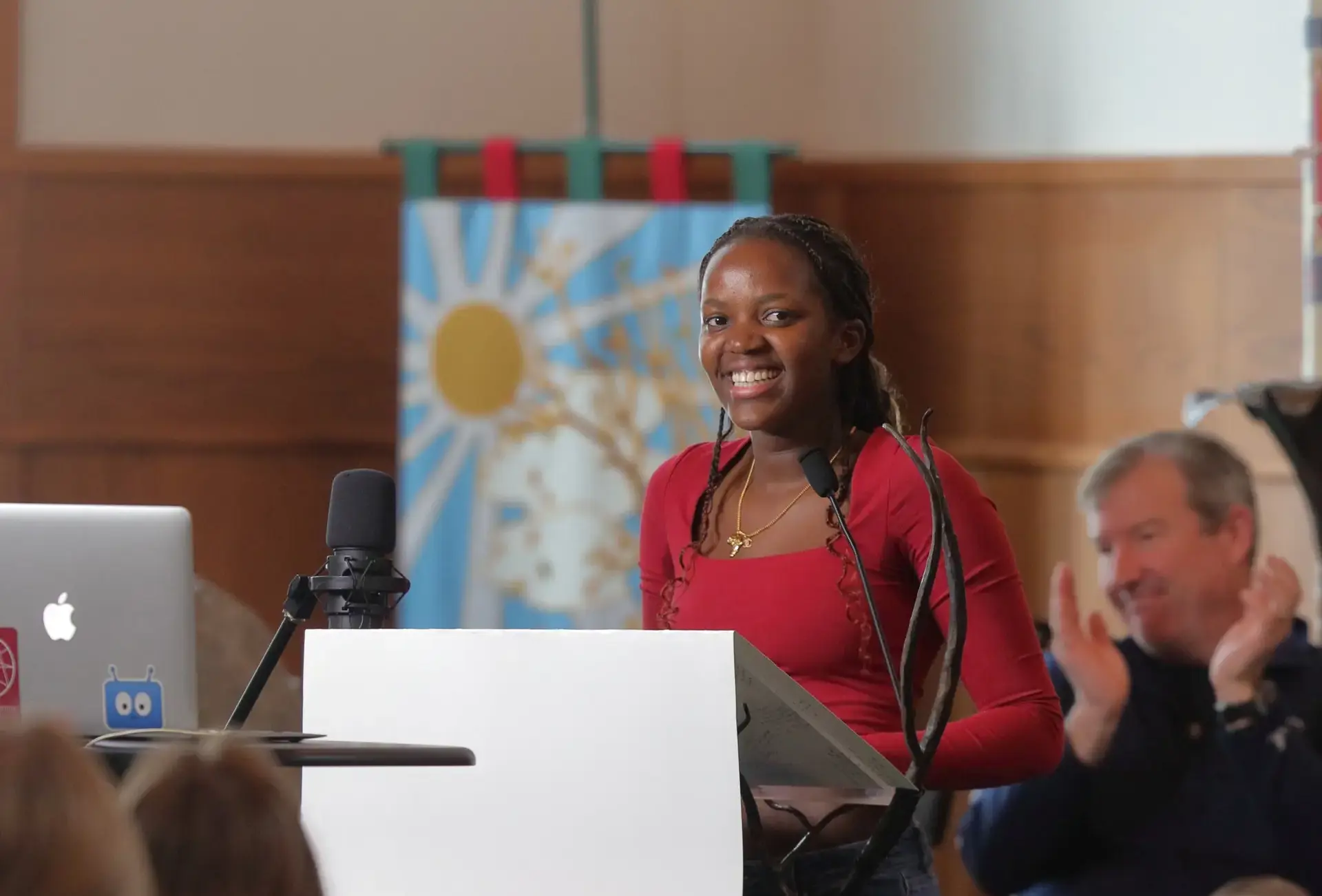 Student speaking at lecturn