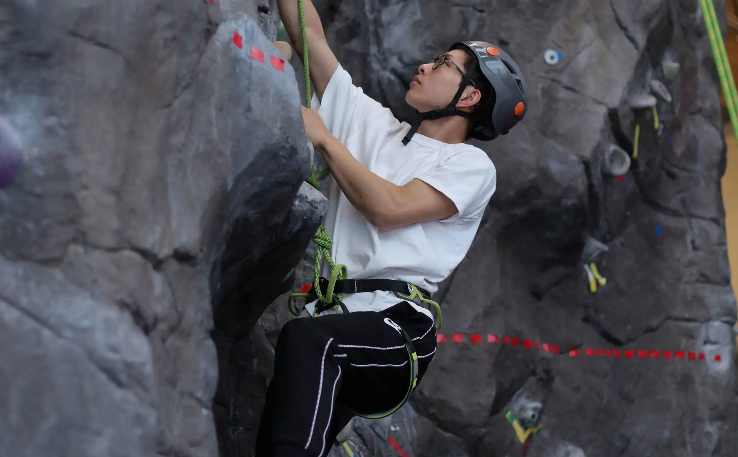 Student rock-climbing