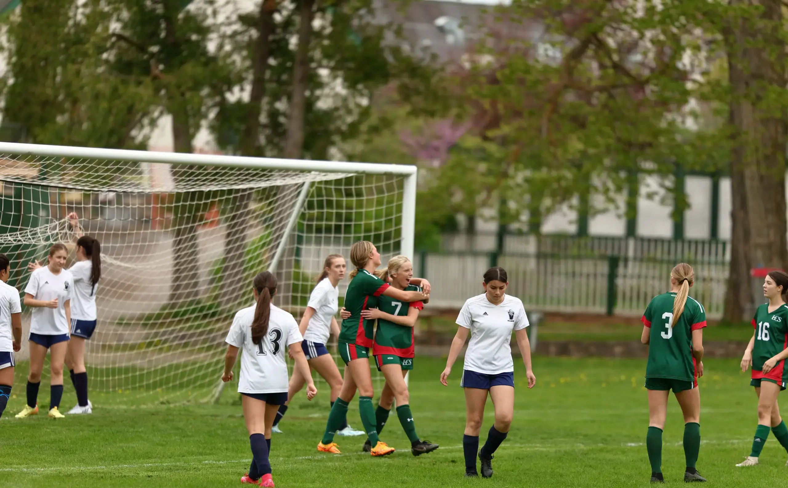Students playing soccer