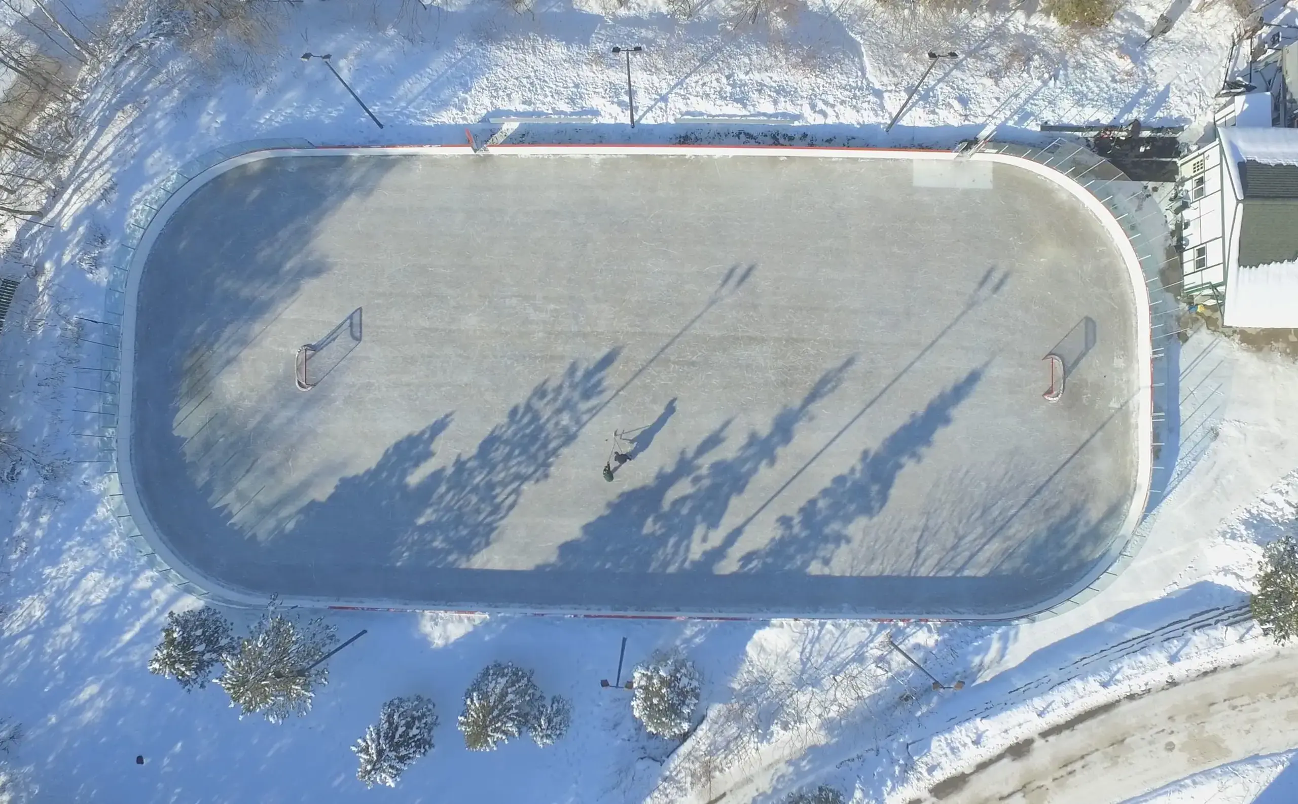 Snowy, aerial view of sports pitch