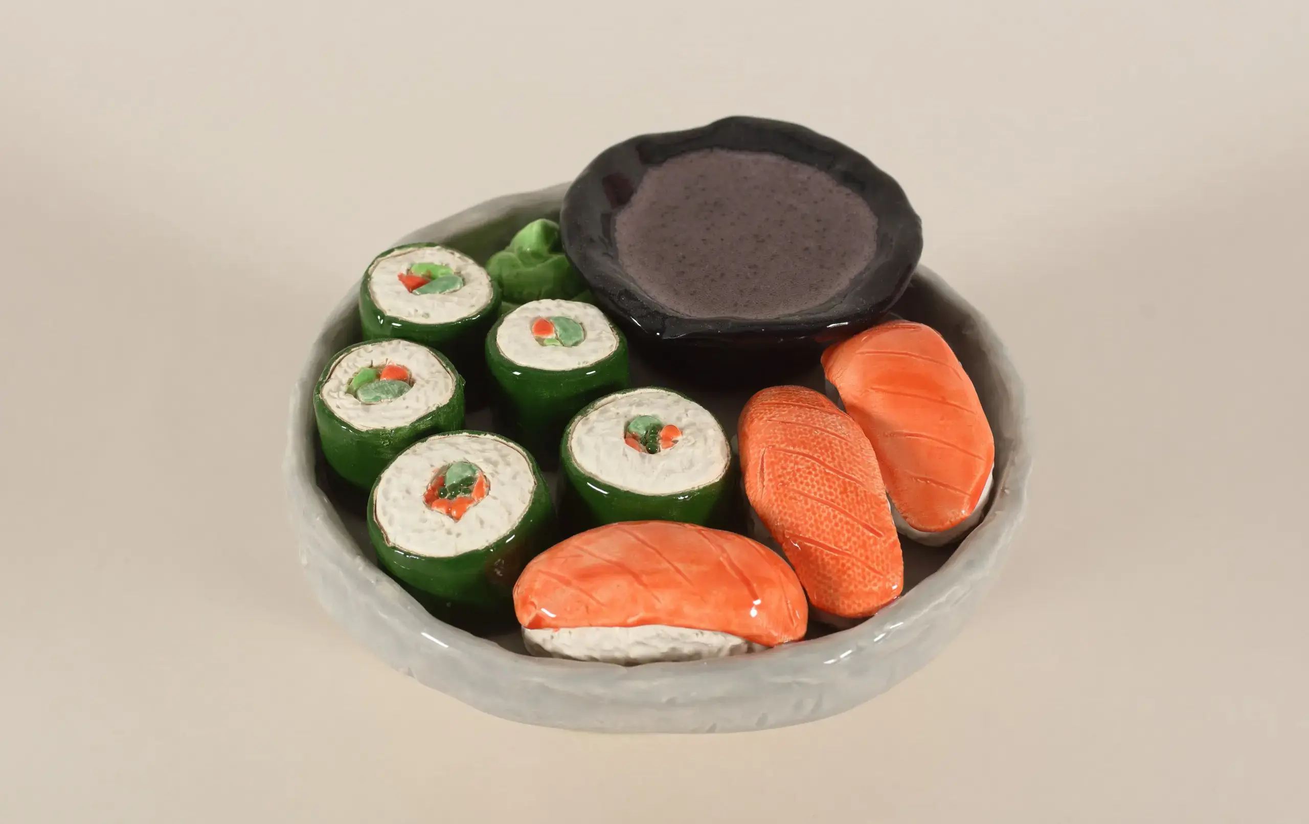 Ceramic sculpture of sushi