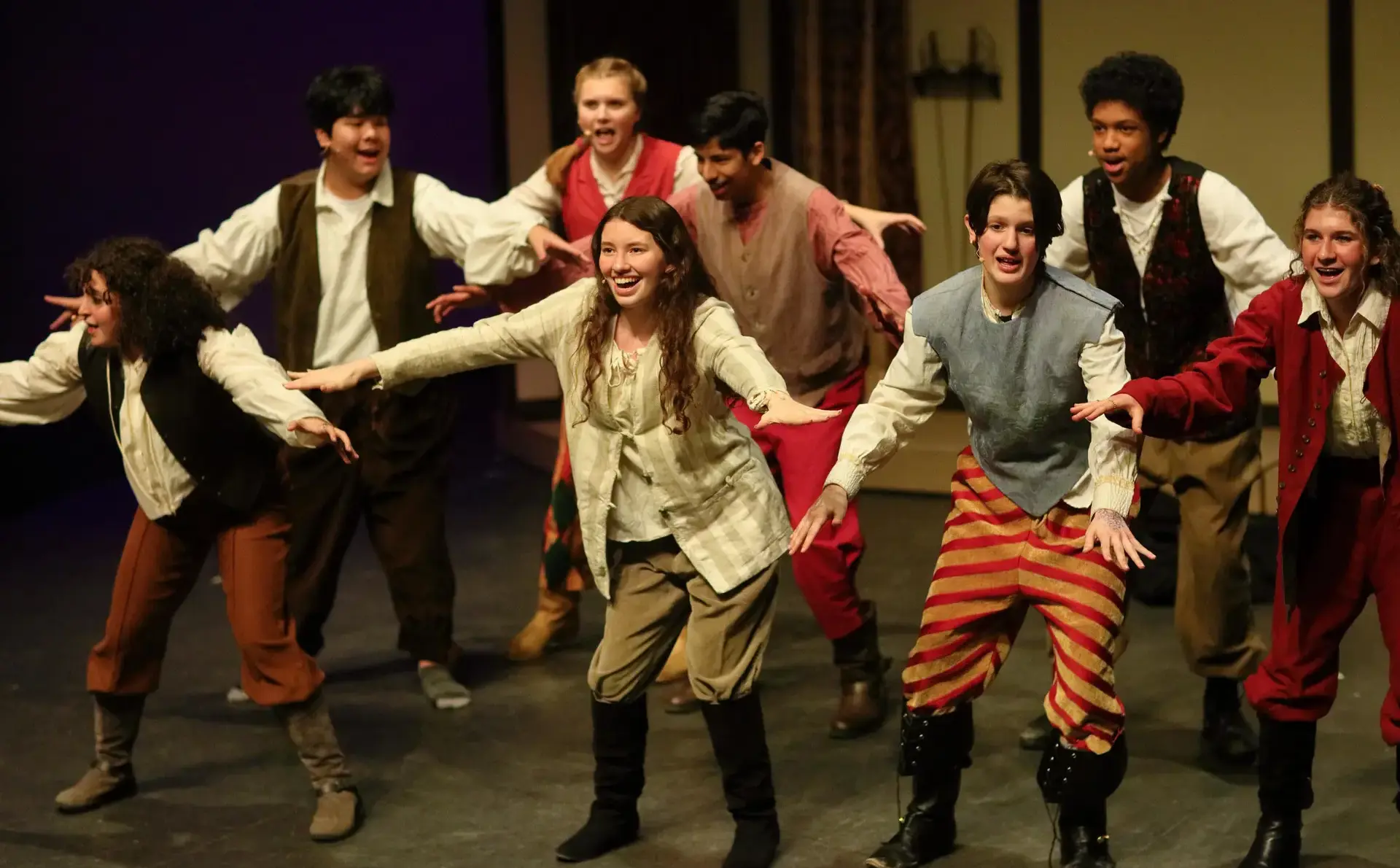 Students performing onstage