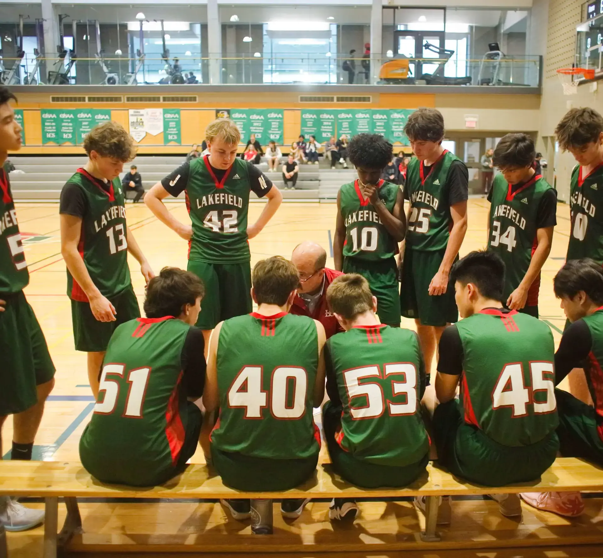 Student athletes in huddle
