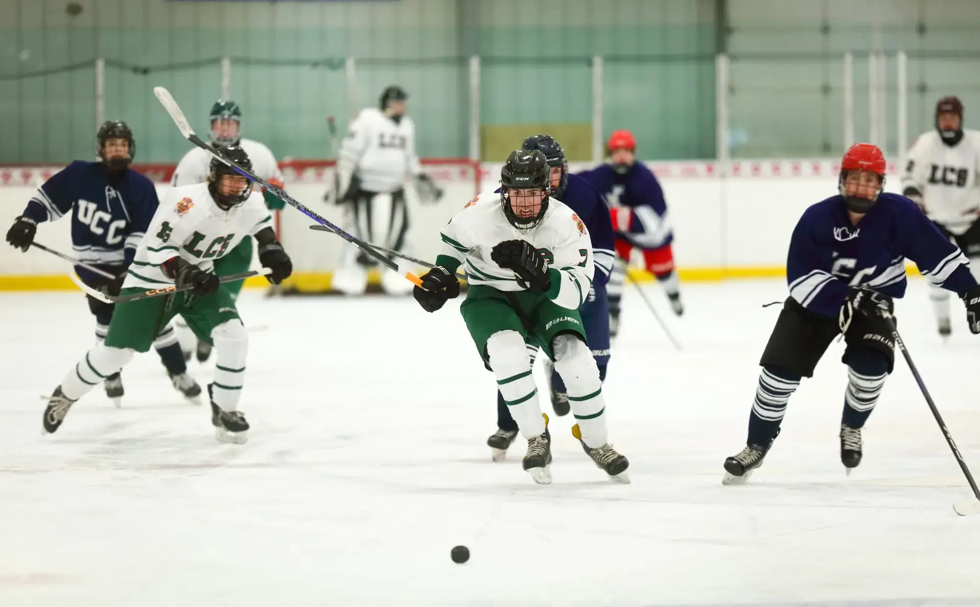 Student athletes playing ice hockey