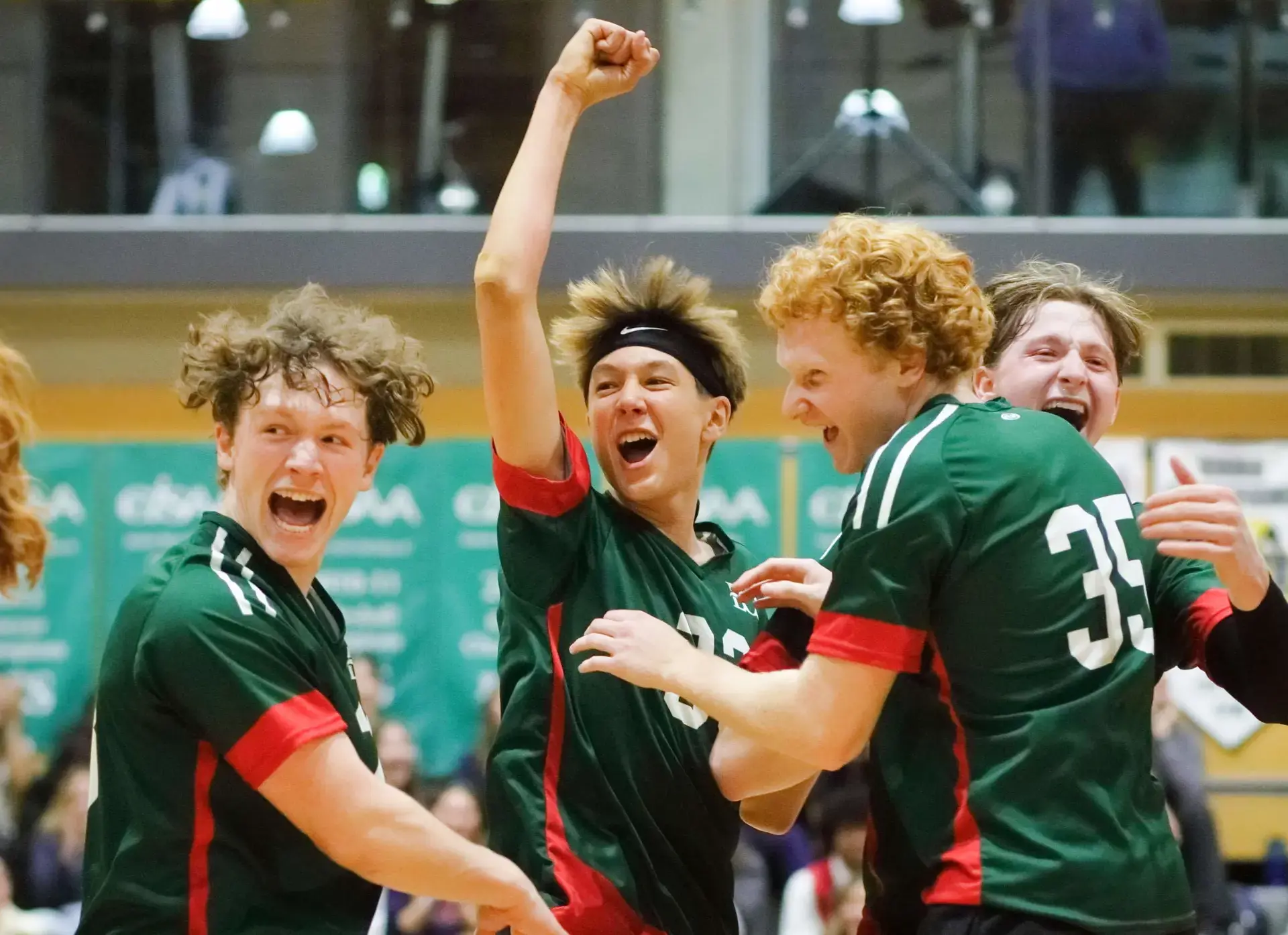 Student hockey players celebrating