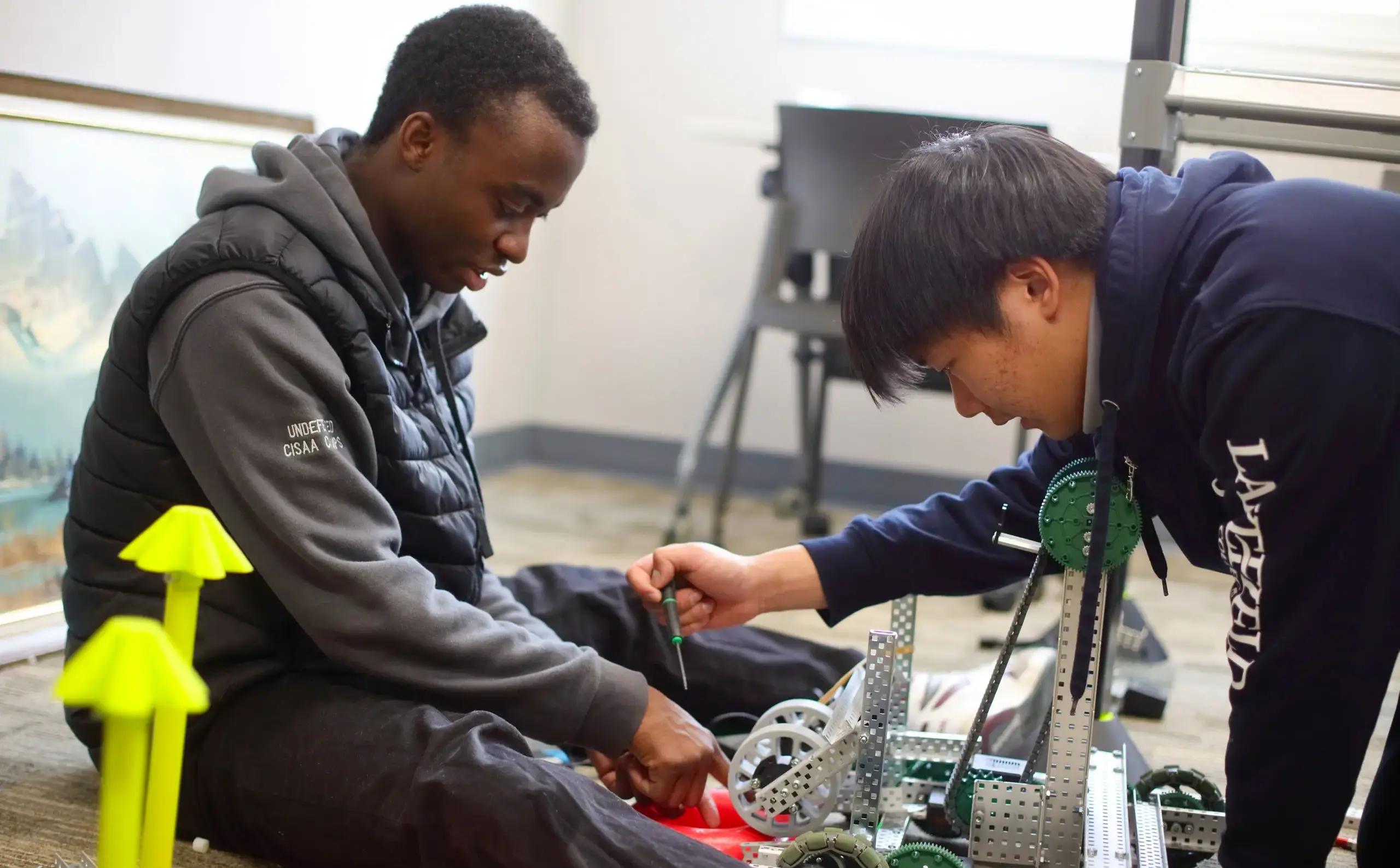 Two students working on engineering project