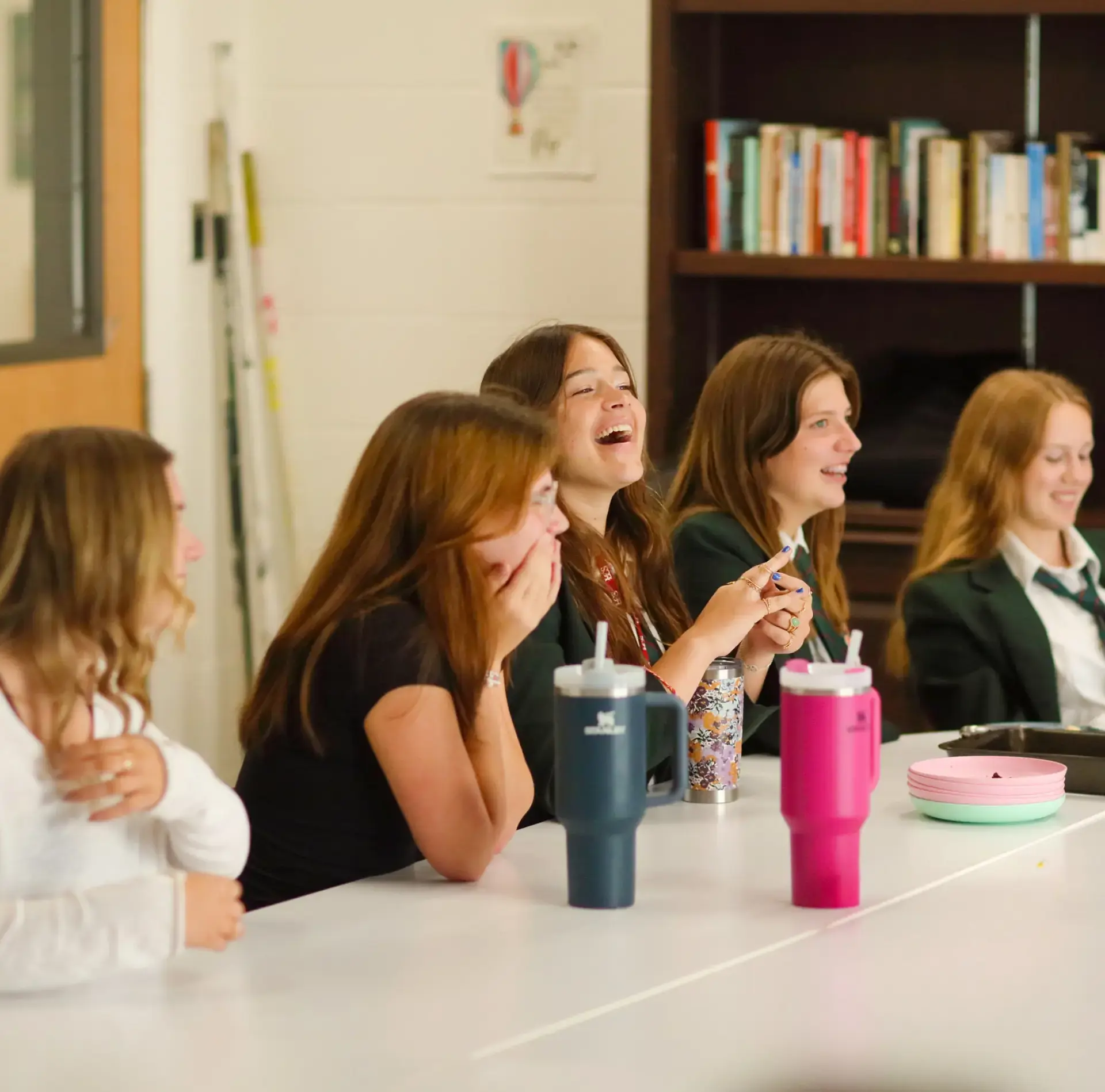 Students at Model UN laughing together