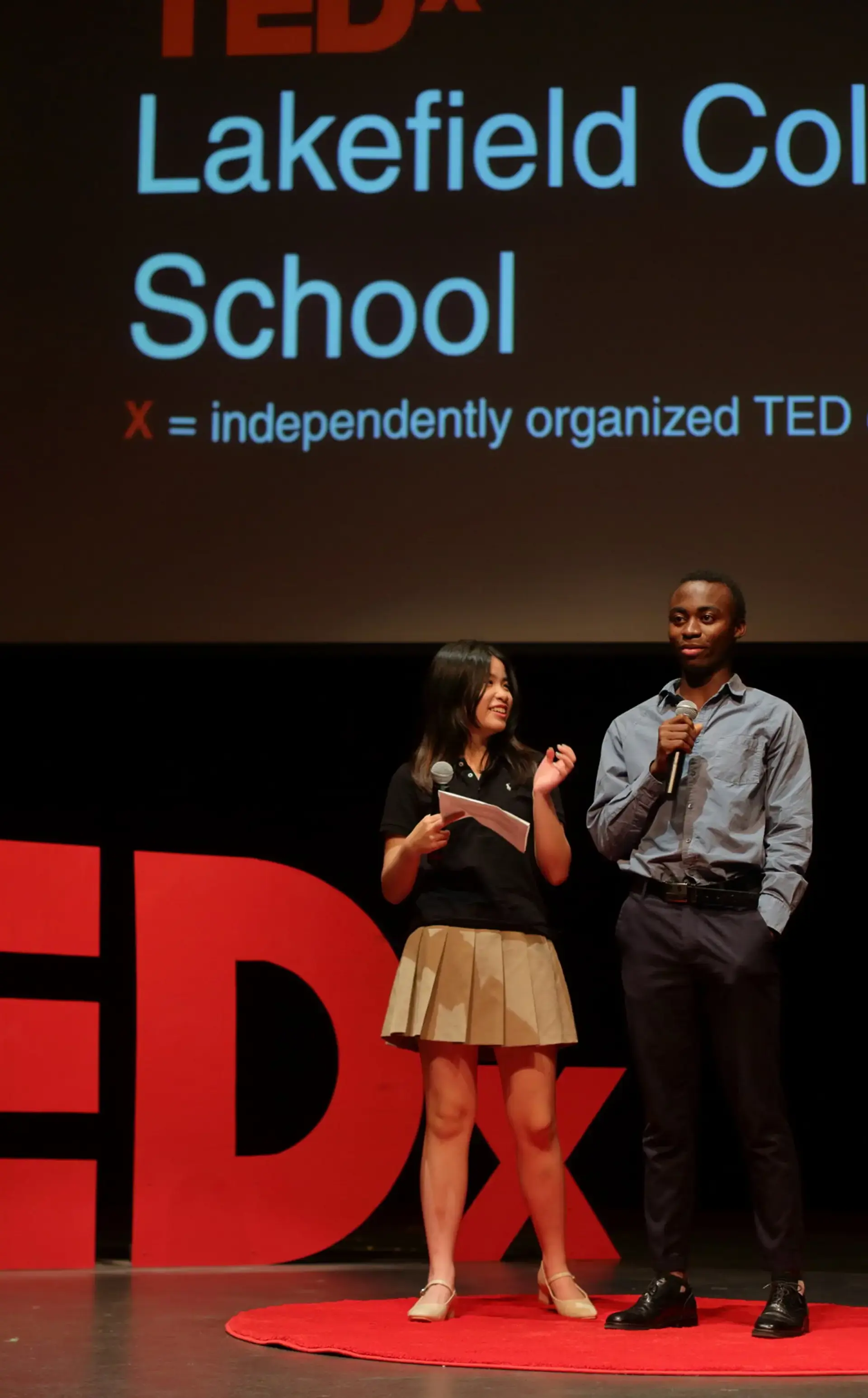Students on stage at TEDx Talk