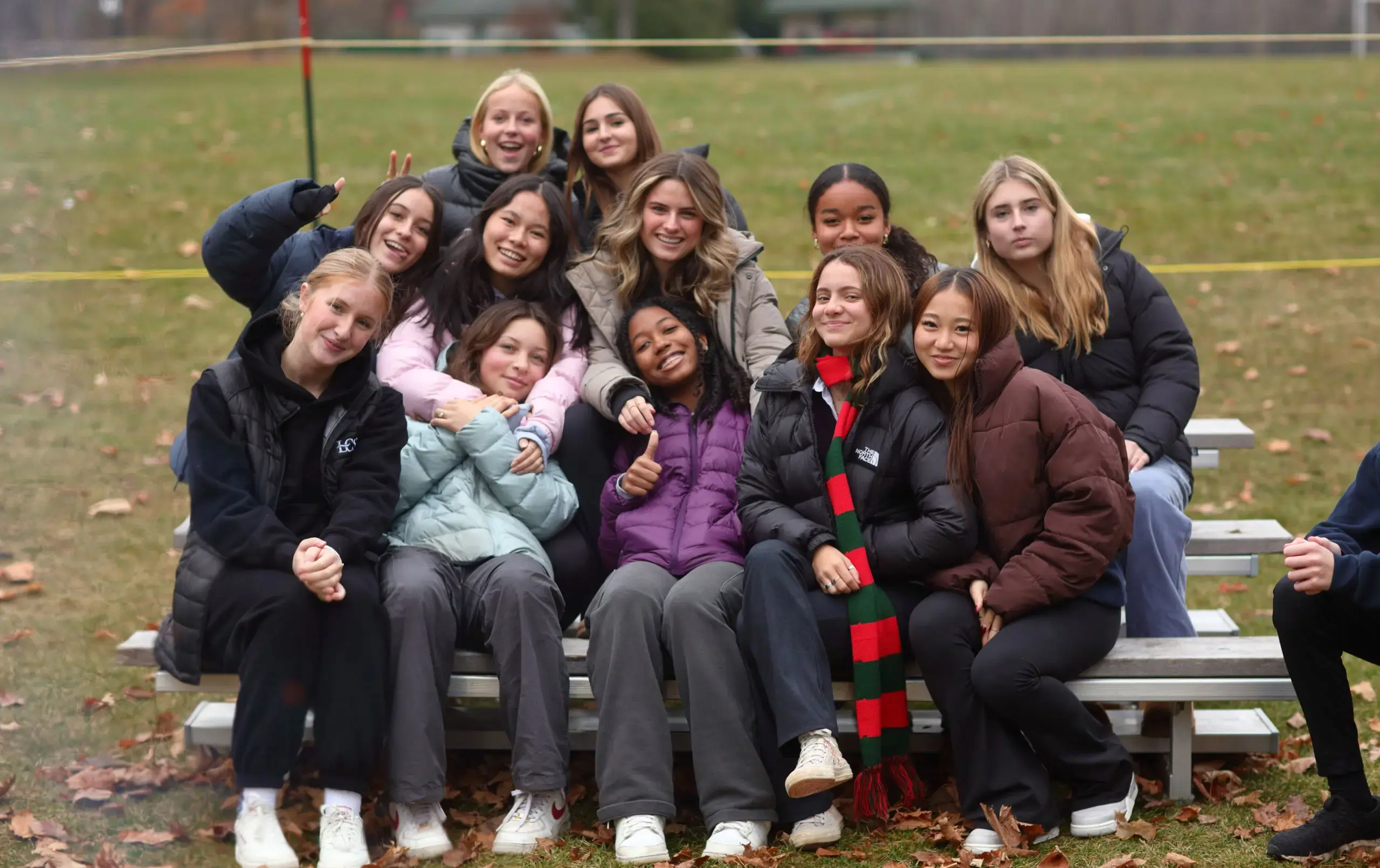 Students sitting on picnic bench