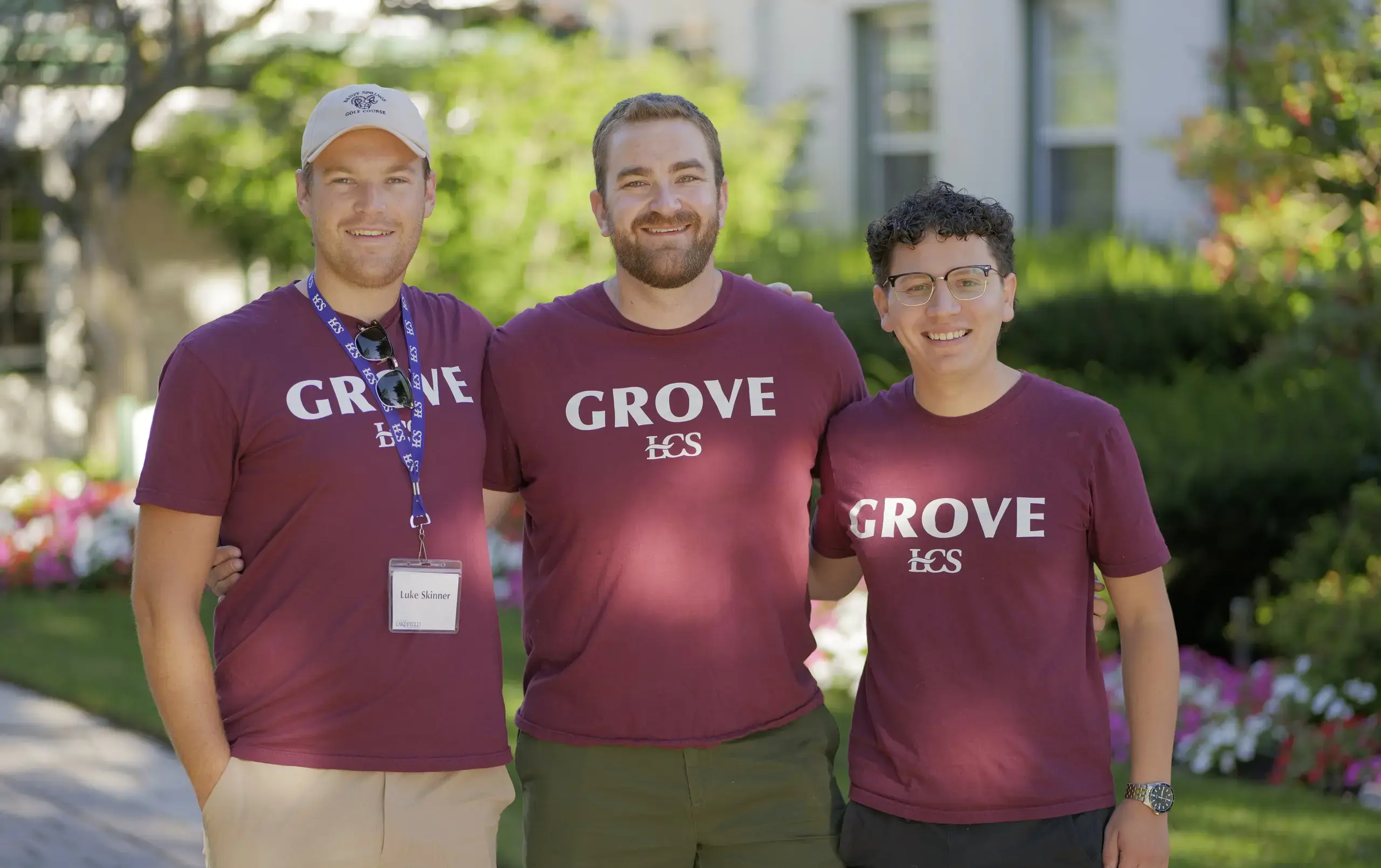Grove House team standing outside of the beautiful Grove Reception