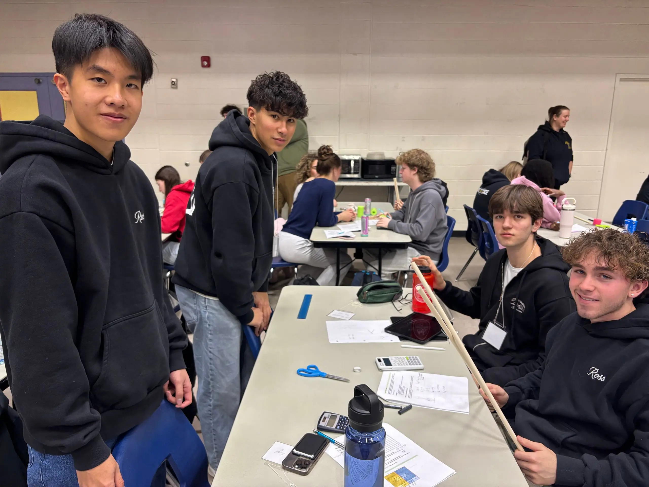 Students sitting at long table