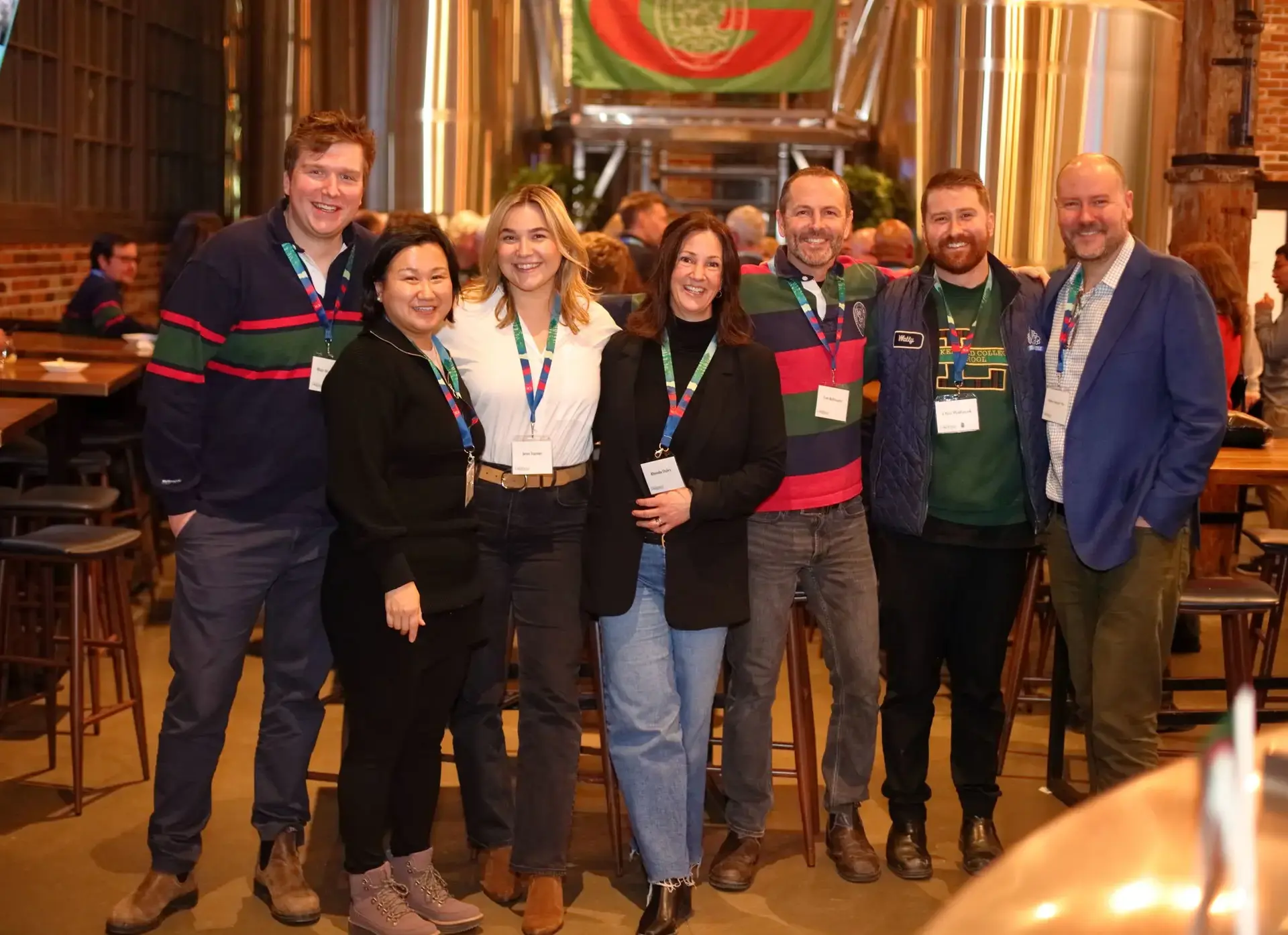 The Foundation Team at an event, wearing lanyards