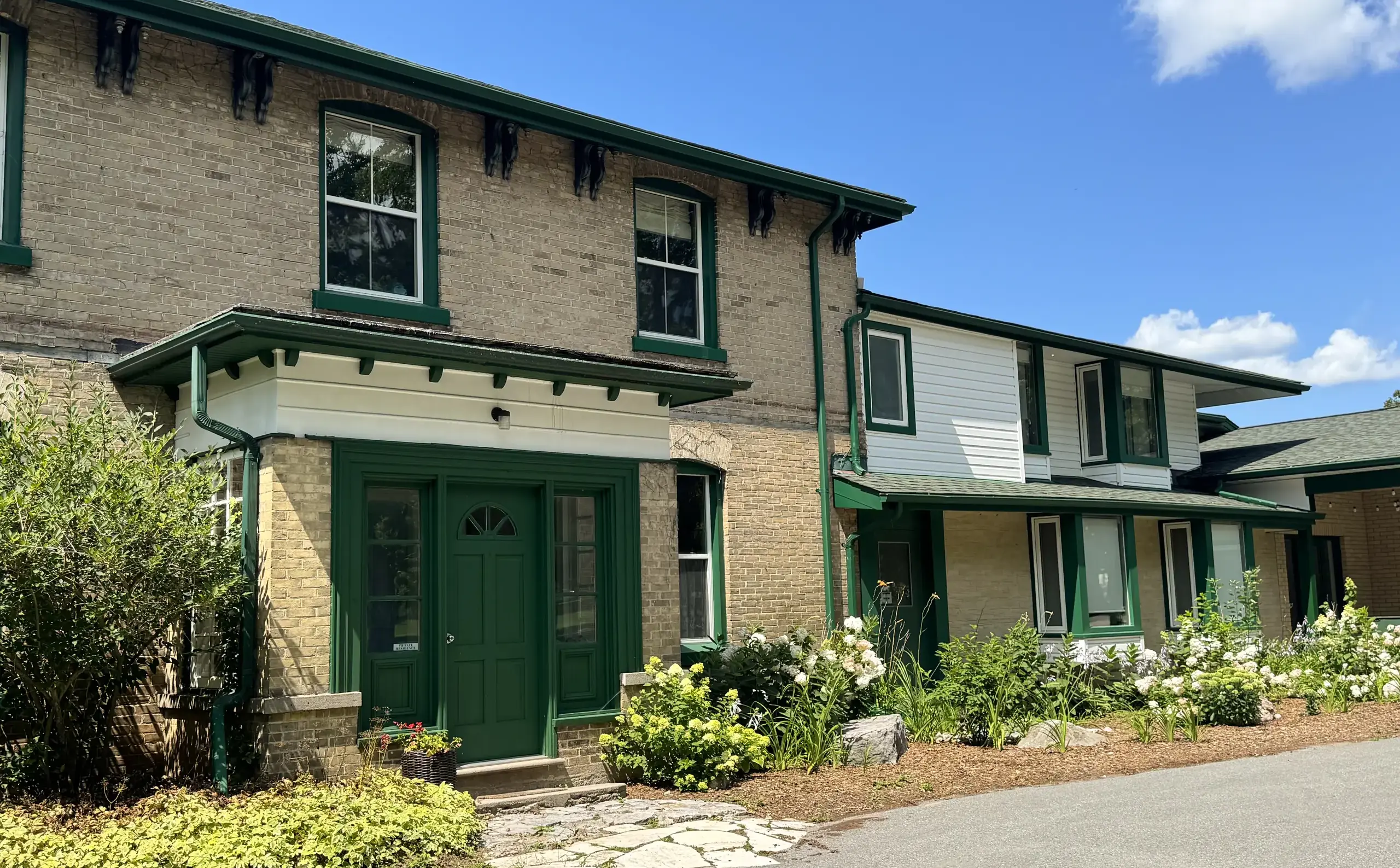 Exterior shot of Ondaatje House, on a bright sunny day