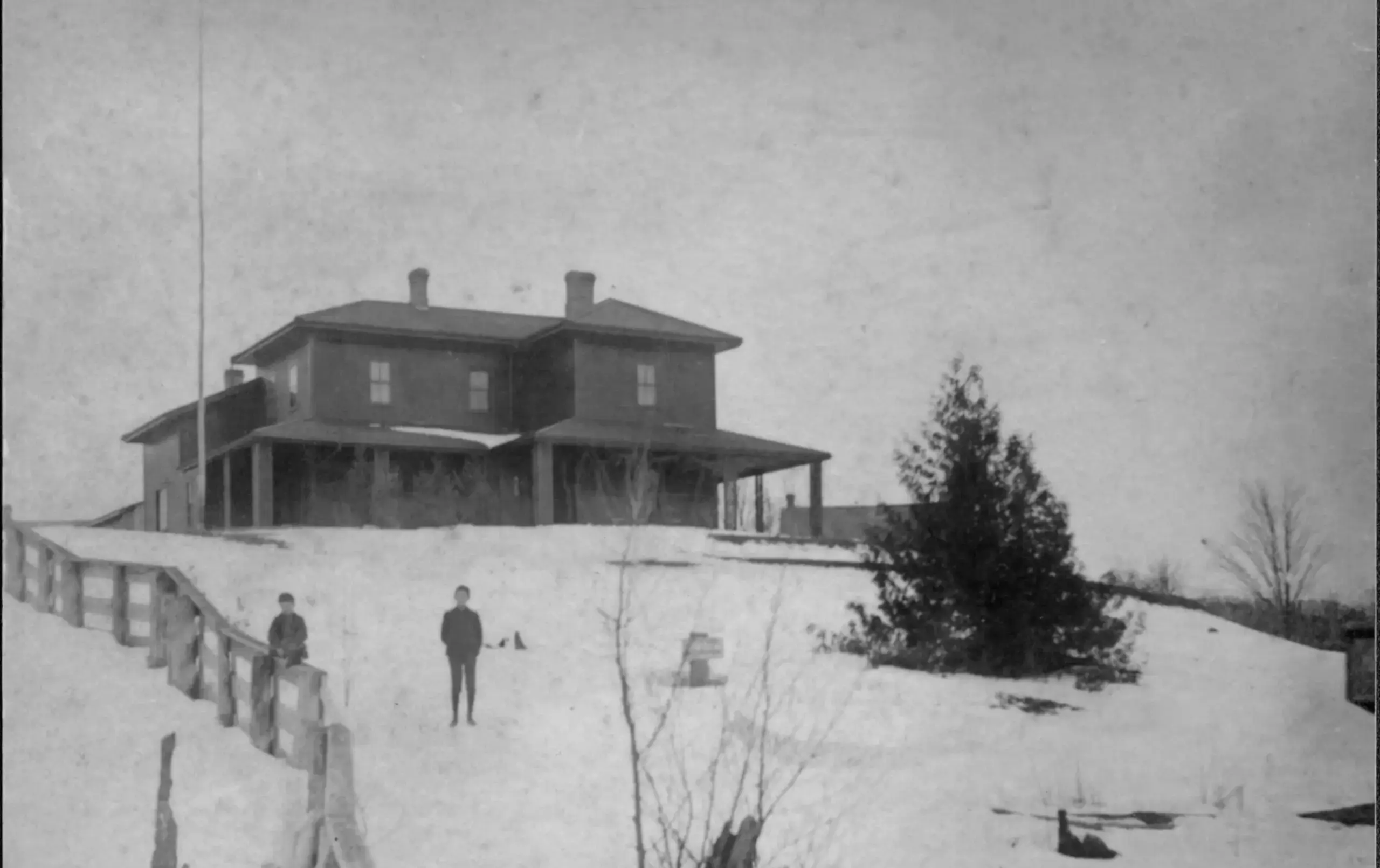 Old photo of farmhouse in snow