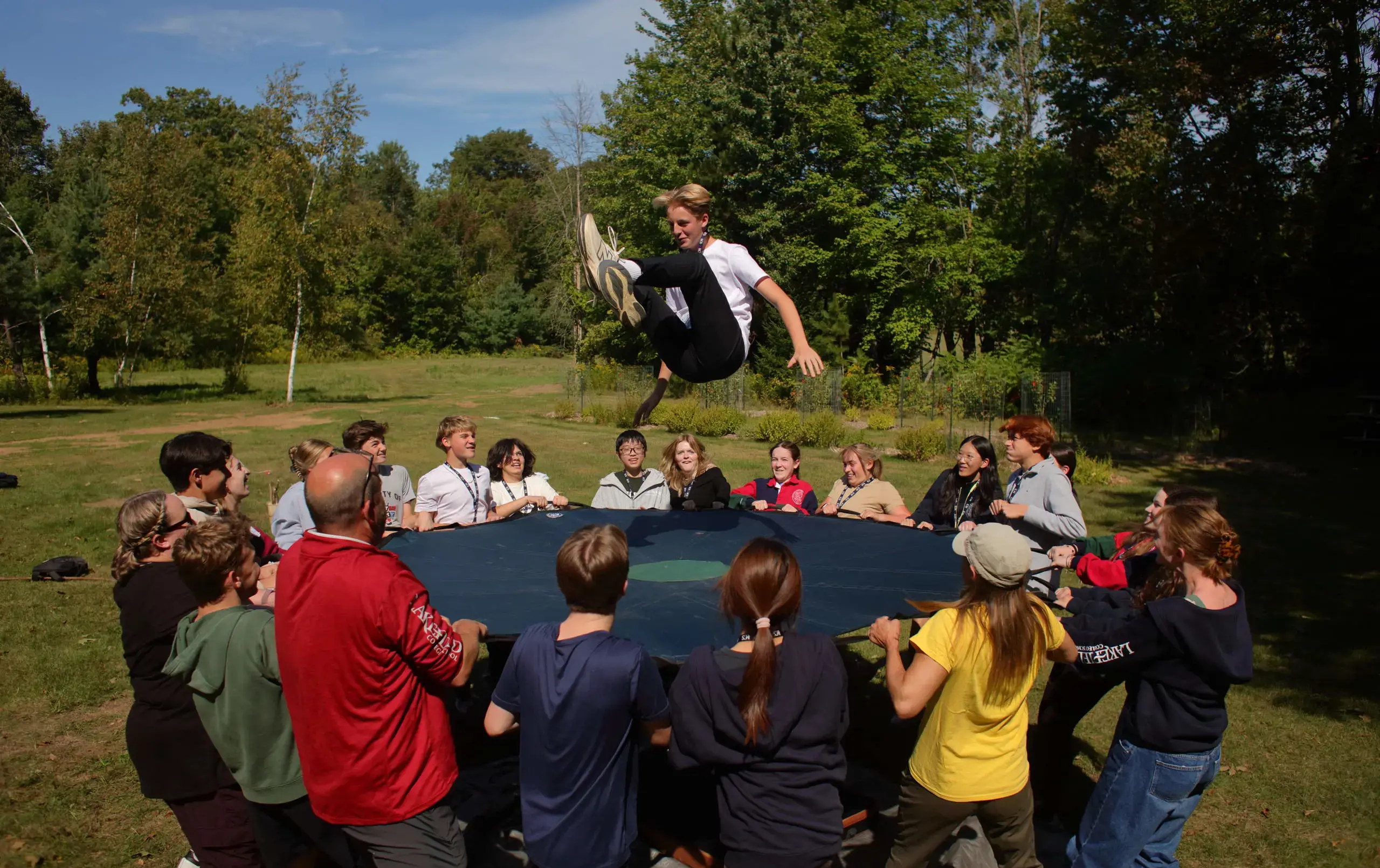 Students doing blanket toss