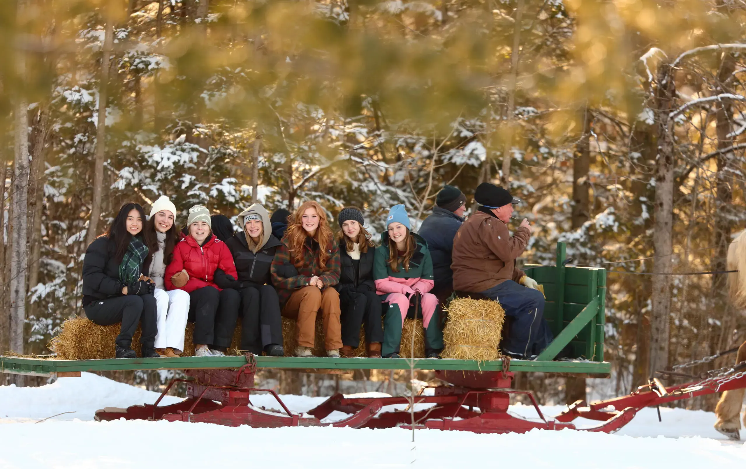Students being pulled along on wagon