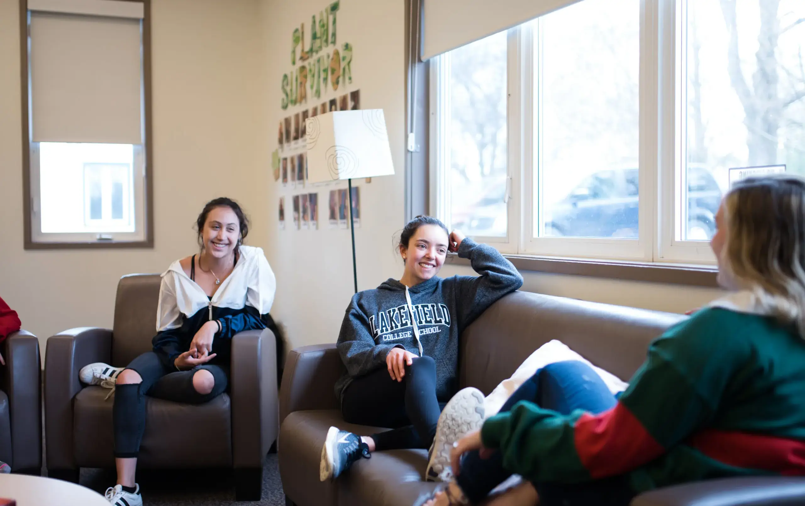 Students relaxing on sofas