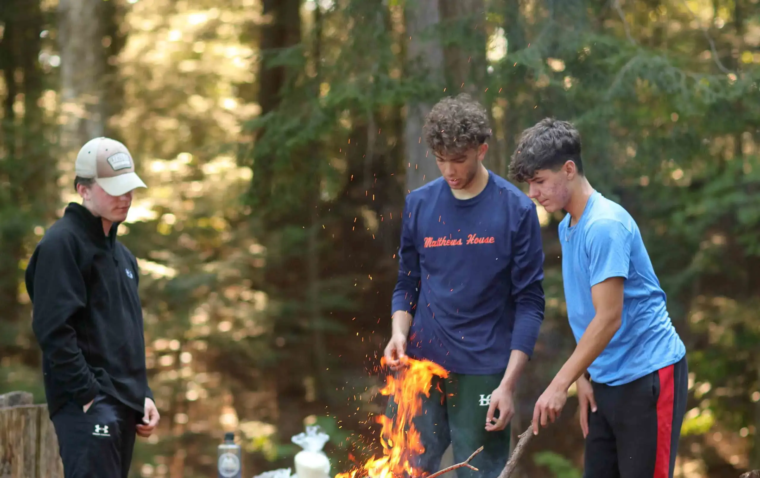 Students gathered around bonfire