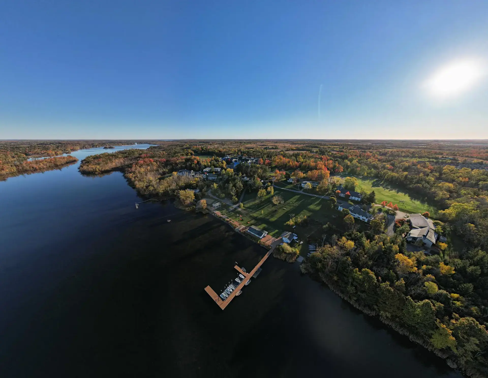 Aerial shot of Lakefield College School with the waterfront in the foreground 