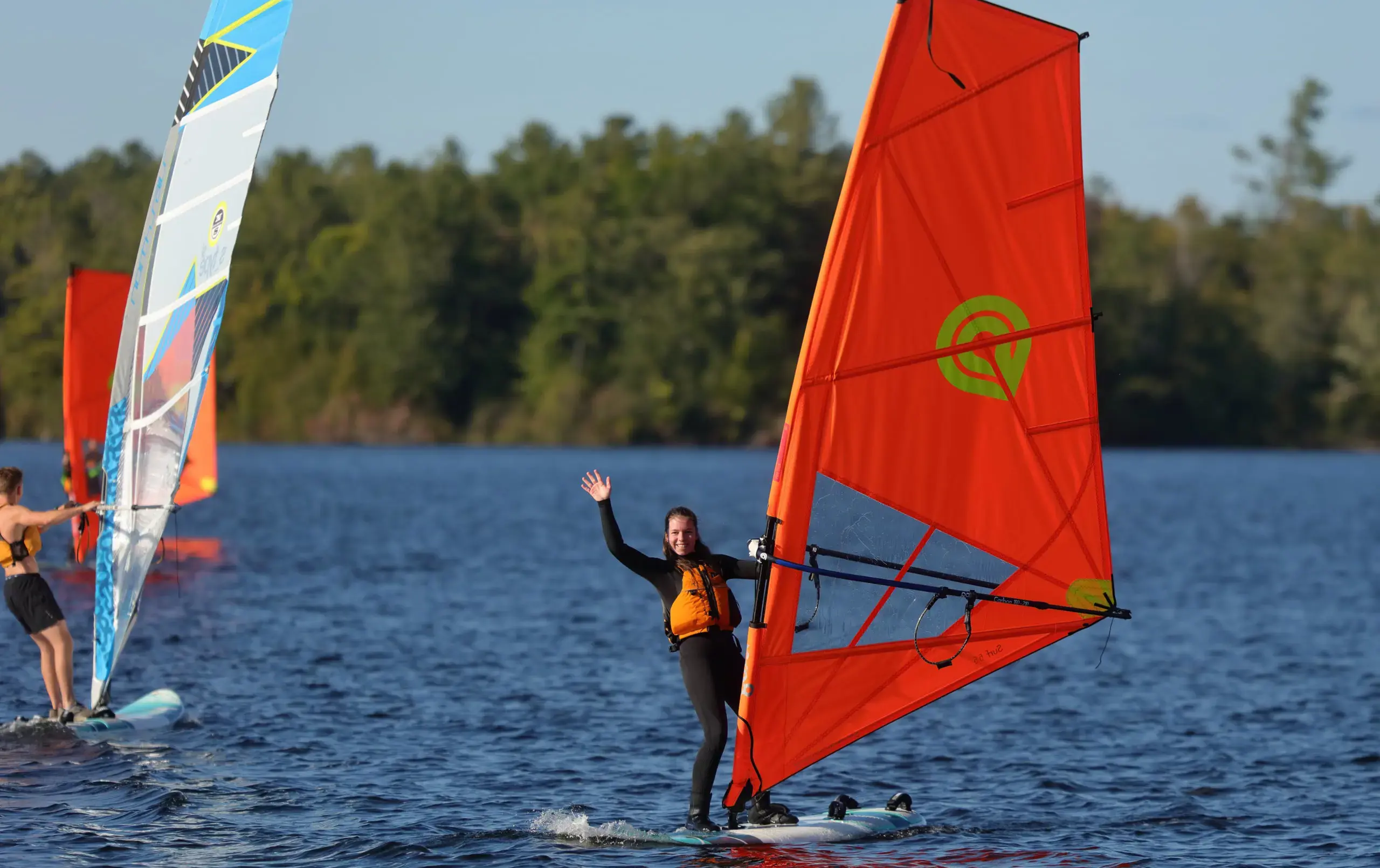 Smiling windsurfing student