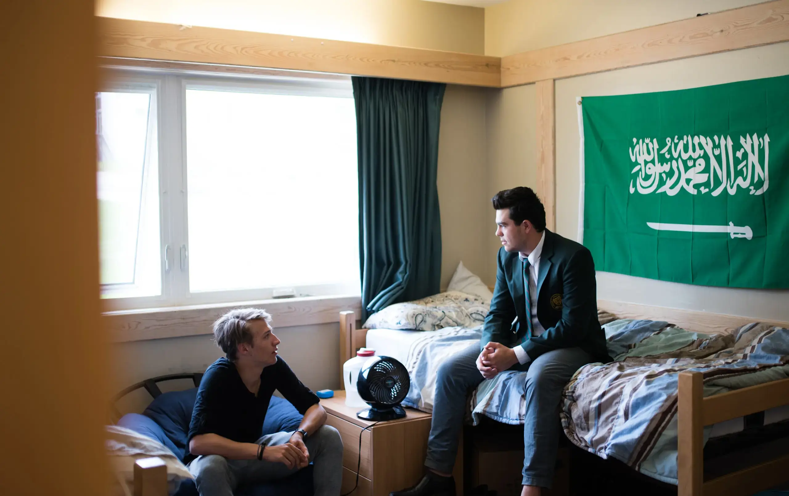 Students hanging out in dorm room