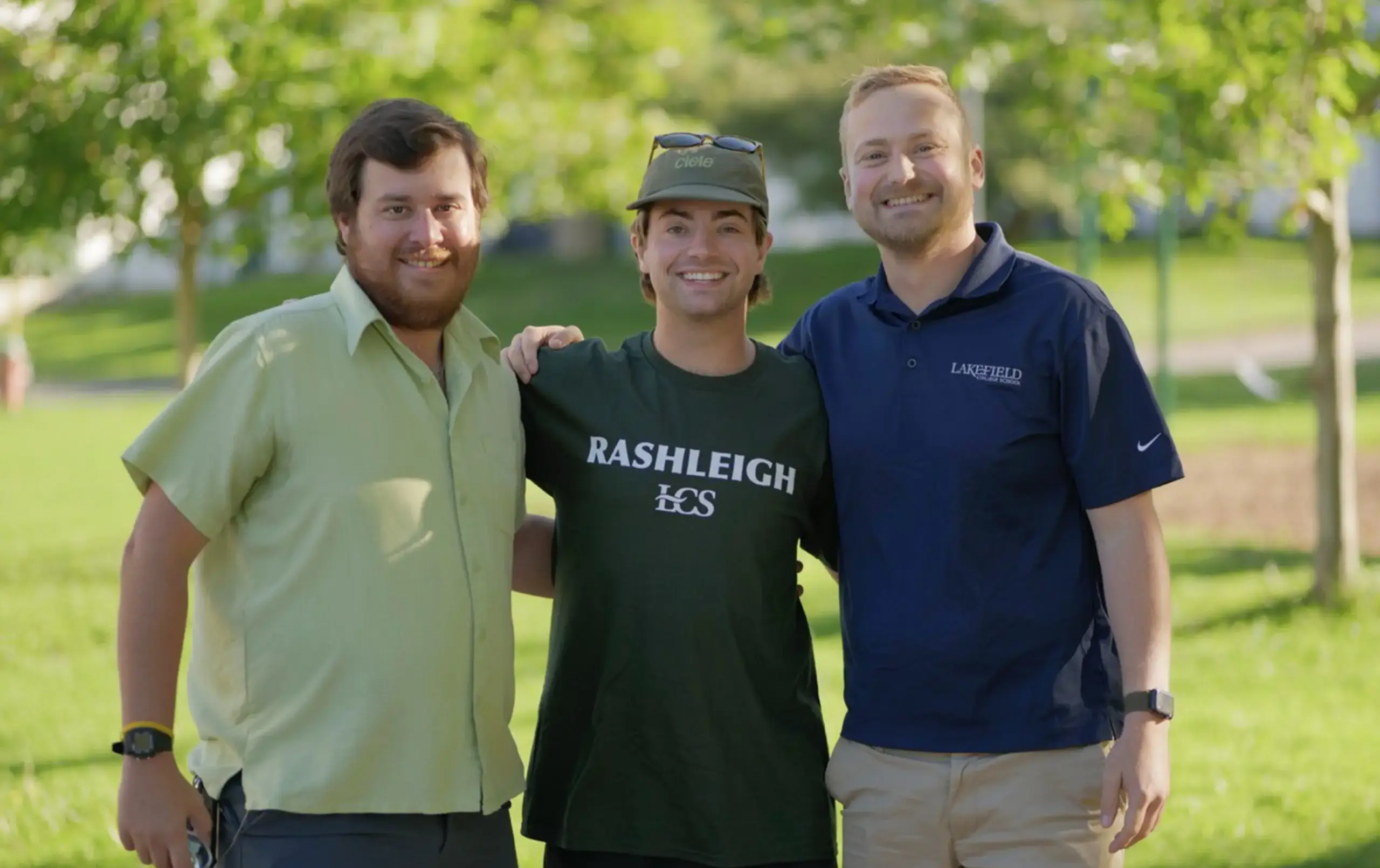 The Rashleigh House Team standing outside on beautiful LCS green