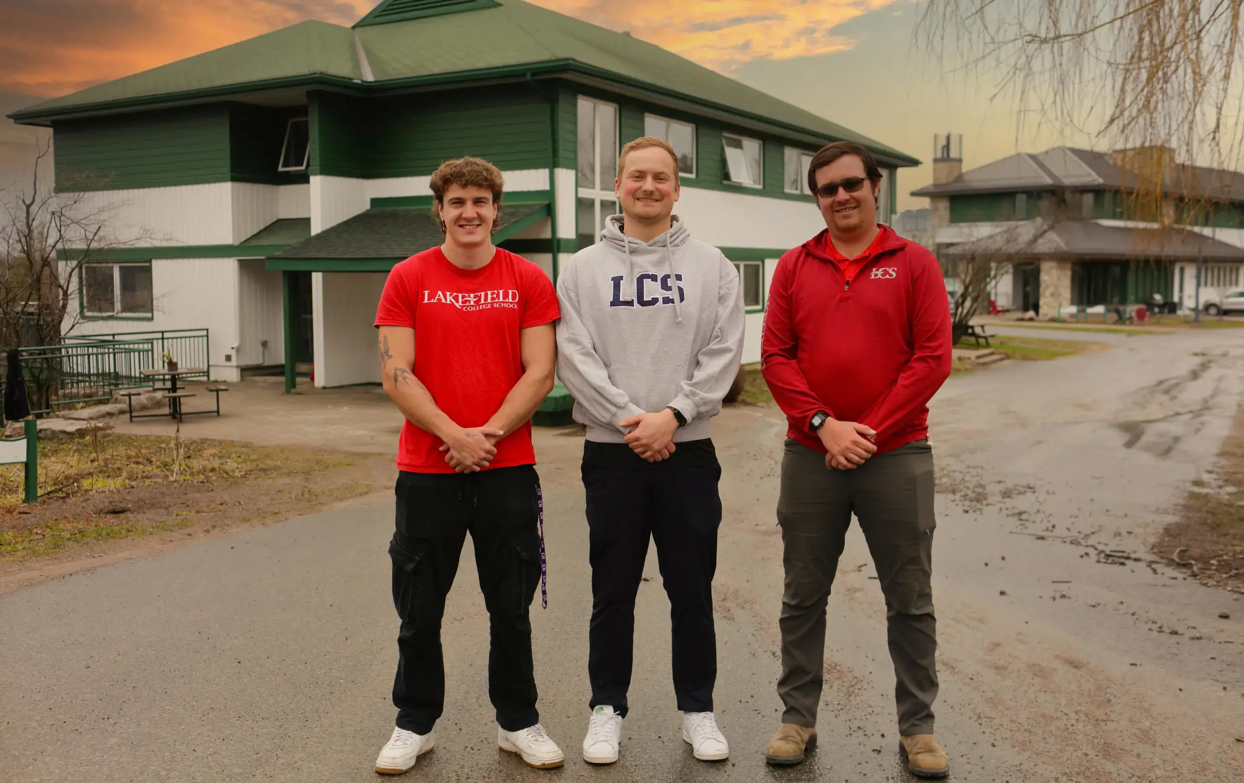 Rashleigh House team standing outside dormitory building