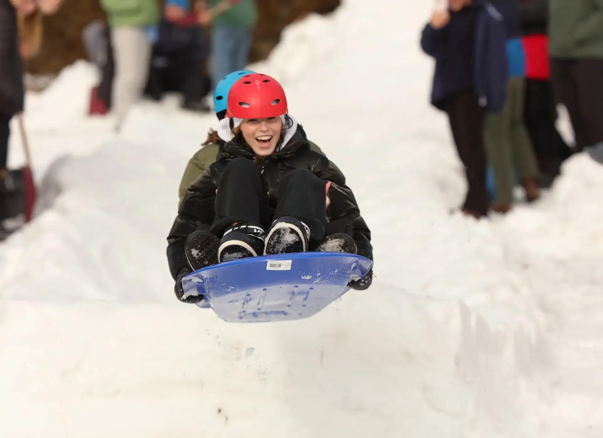Students tobogganing