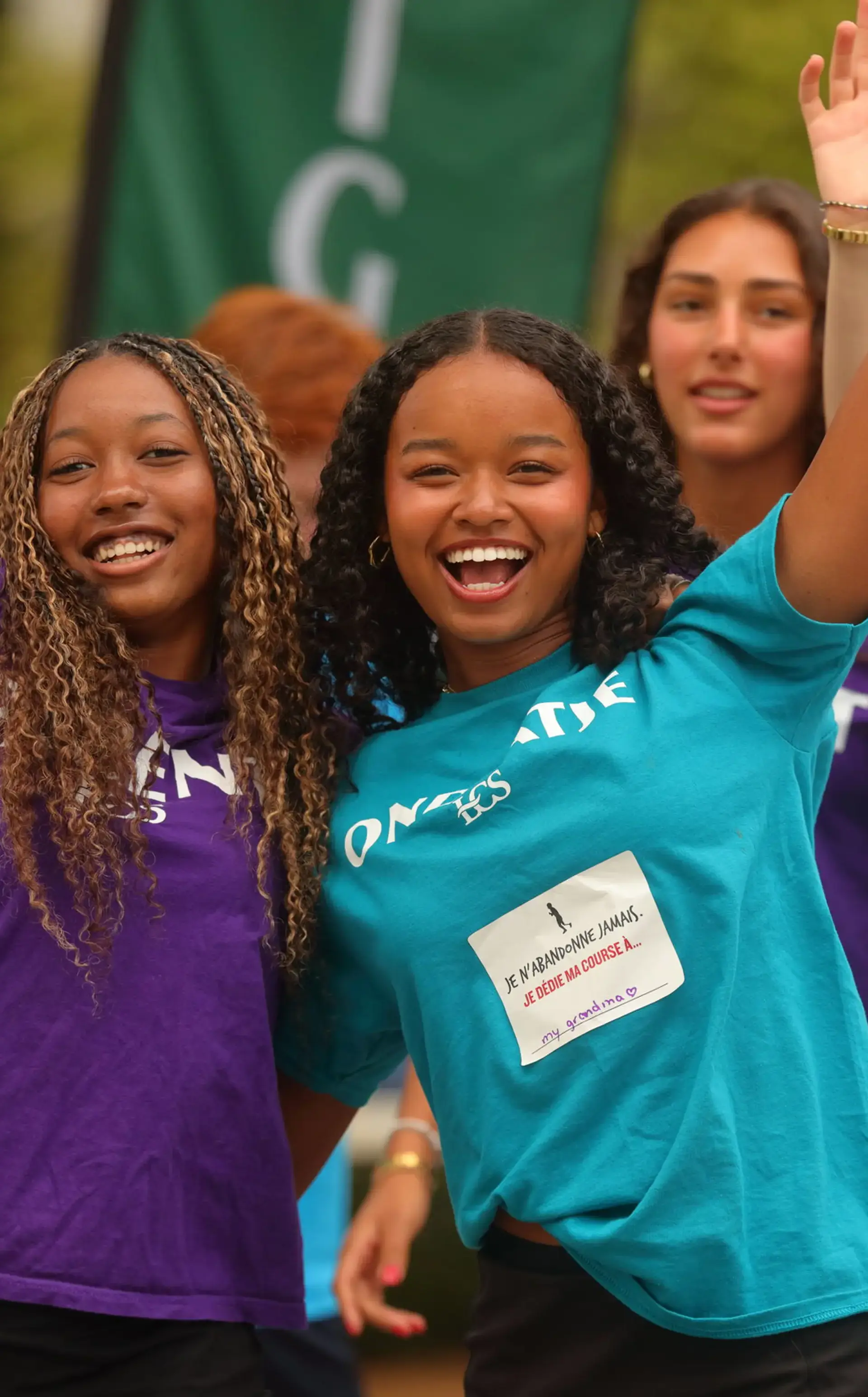 Students in House colours smiling
