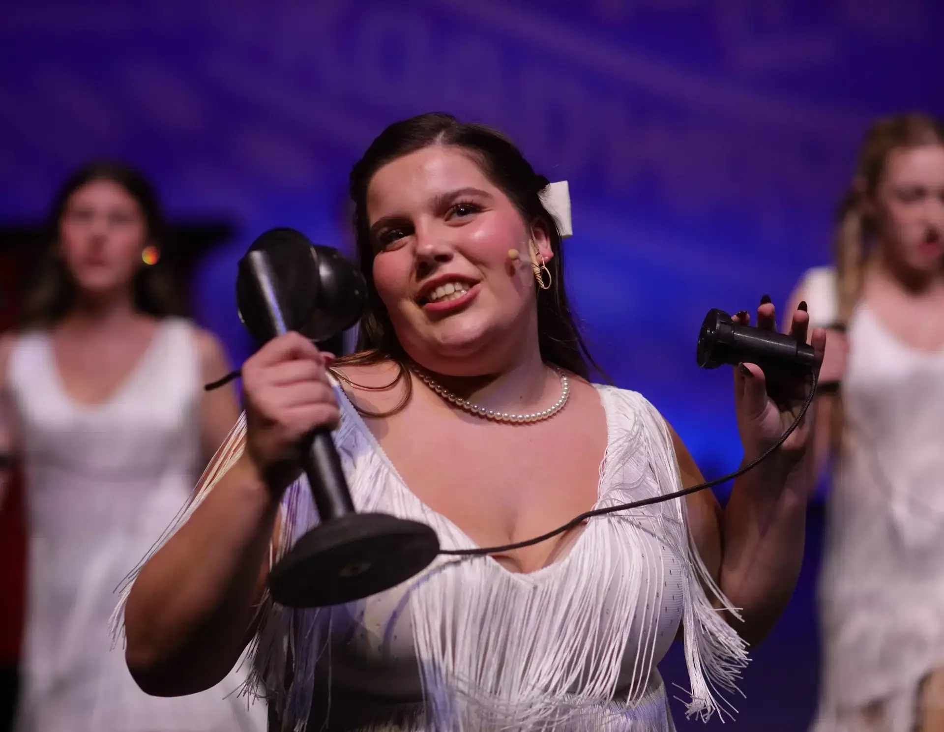 Student performing on stage