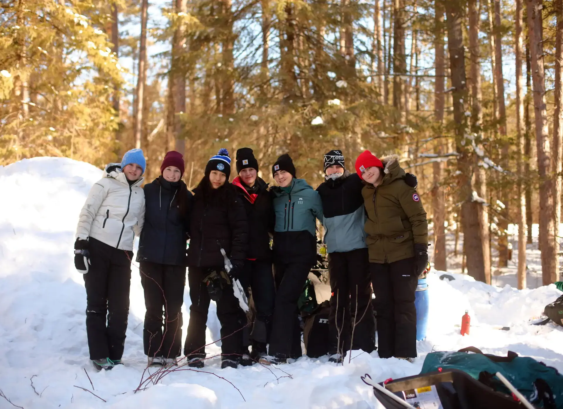 Group of students in snowy forest