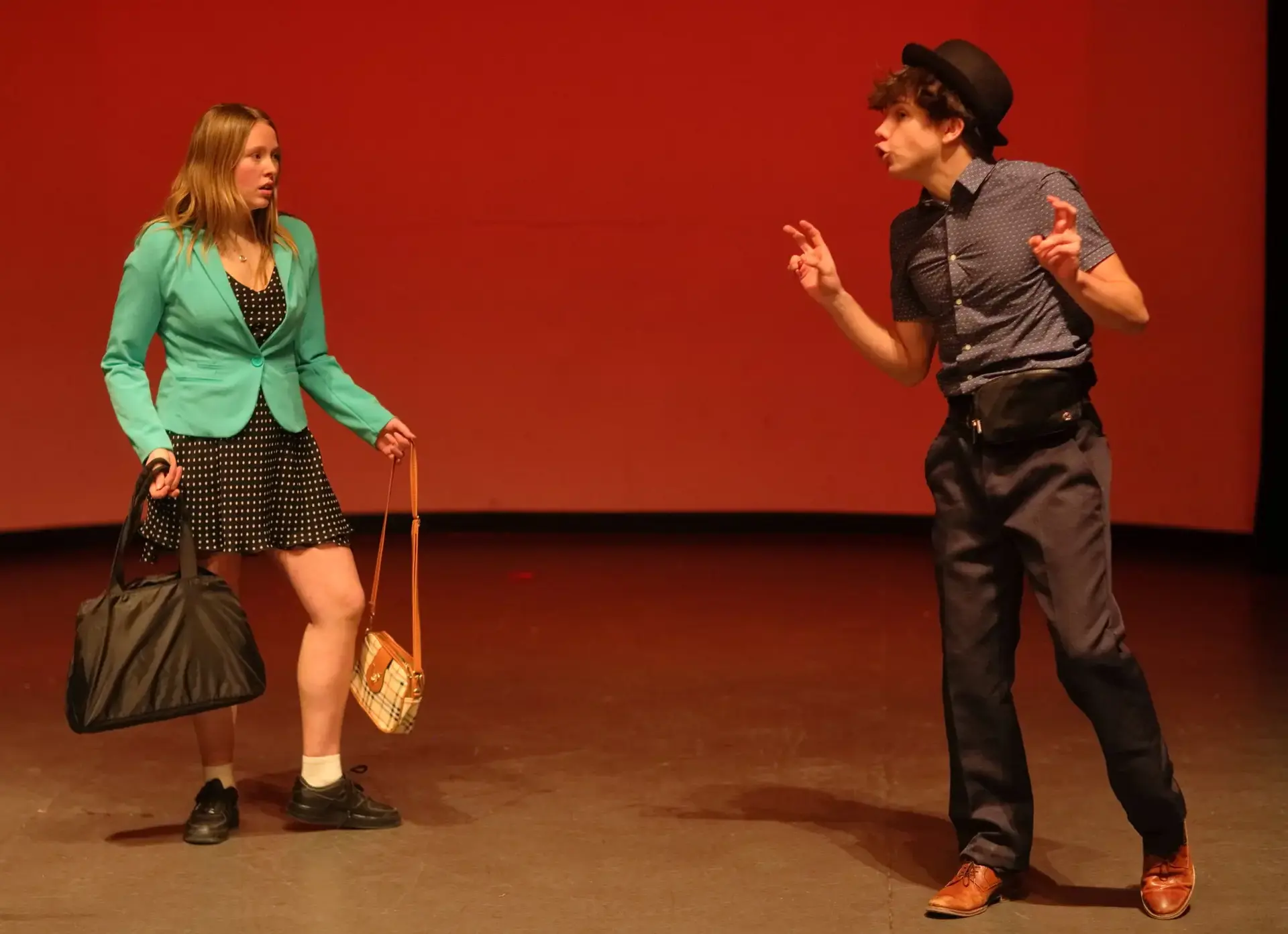 Students performing on stage
