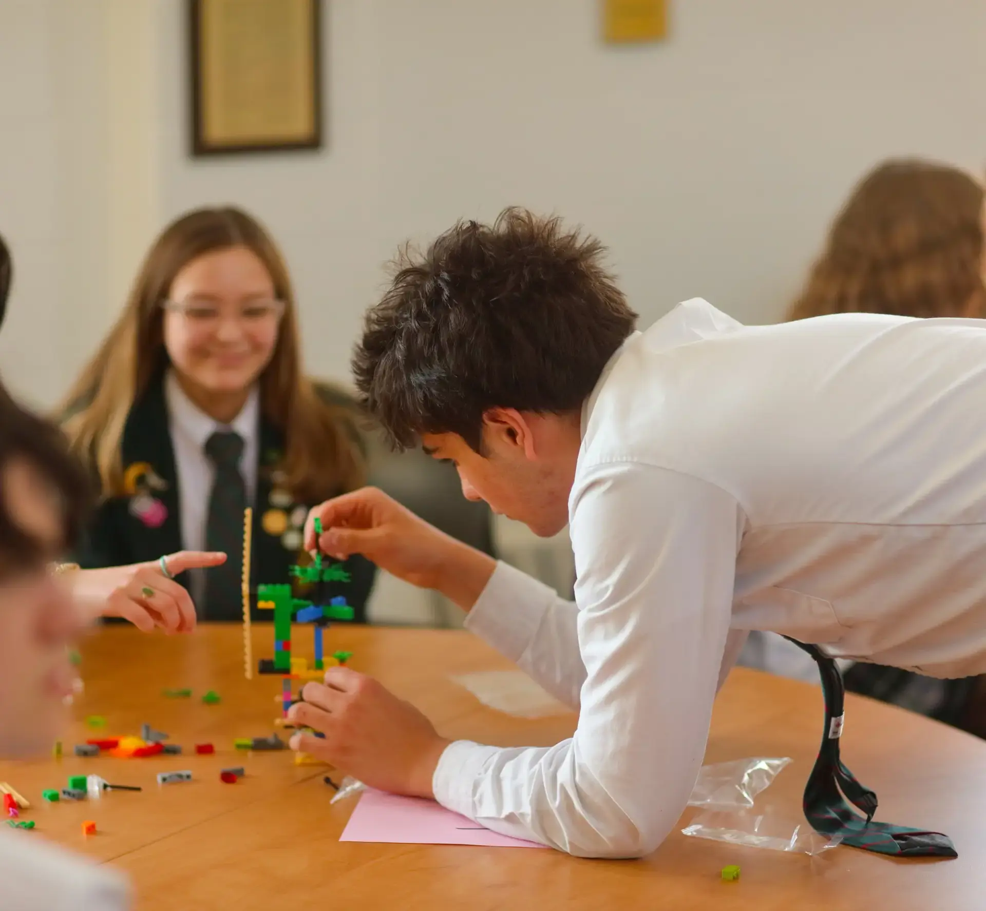 Students building with Lego