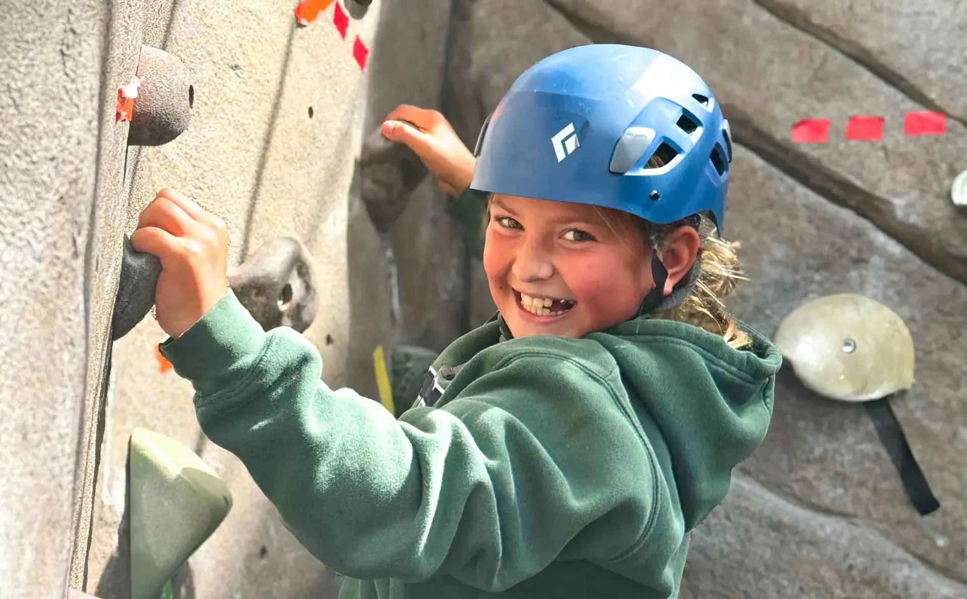 Camper rock climbing