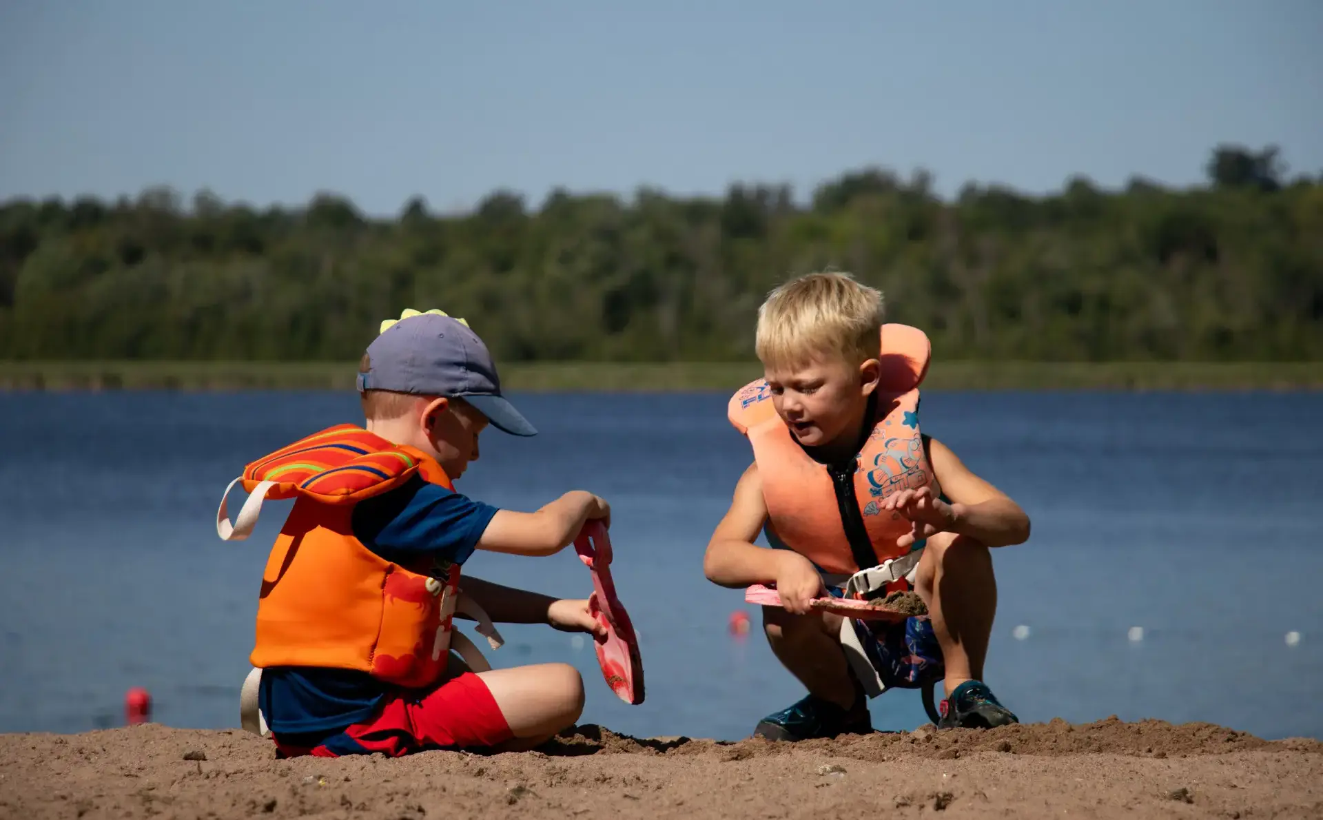 Campers playing in sand