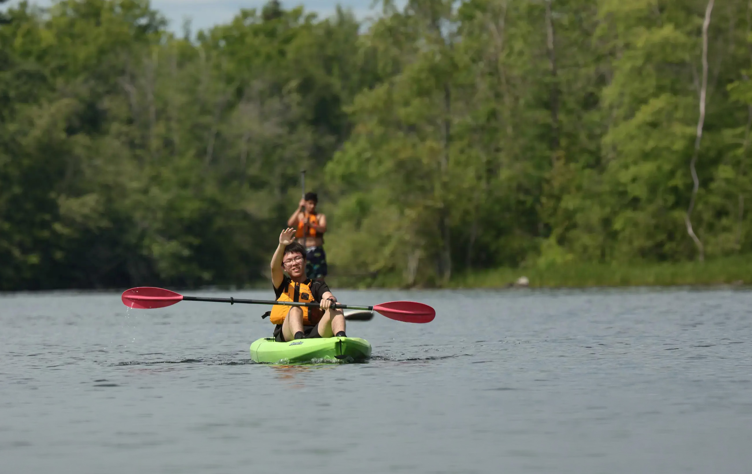 Campers on canoe