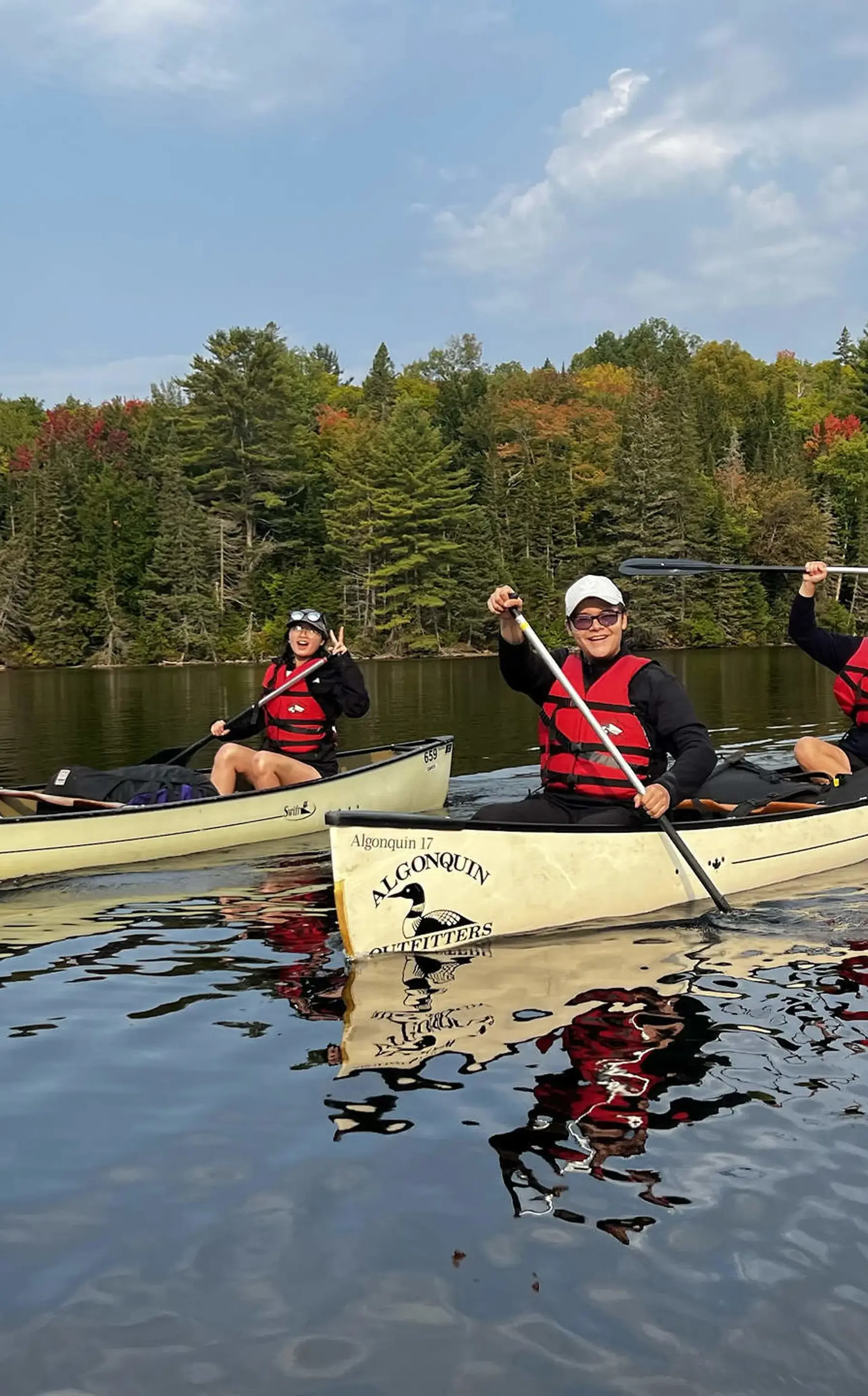 Students and instructors in canoes