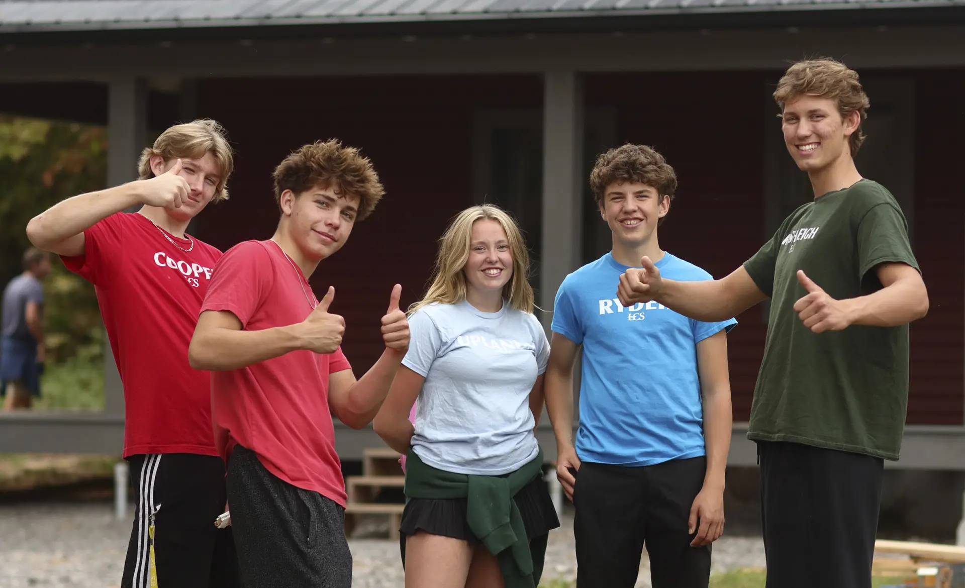 Students at Fall Fair wearing their house t_shirts