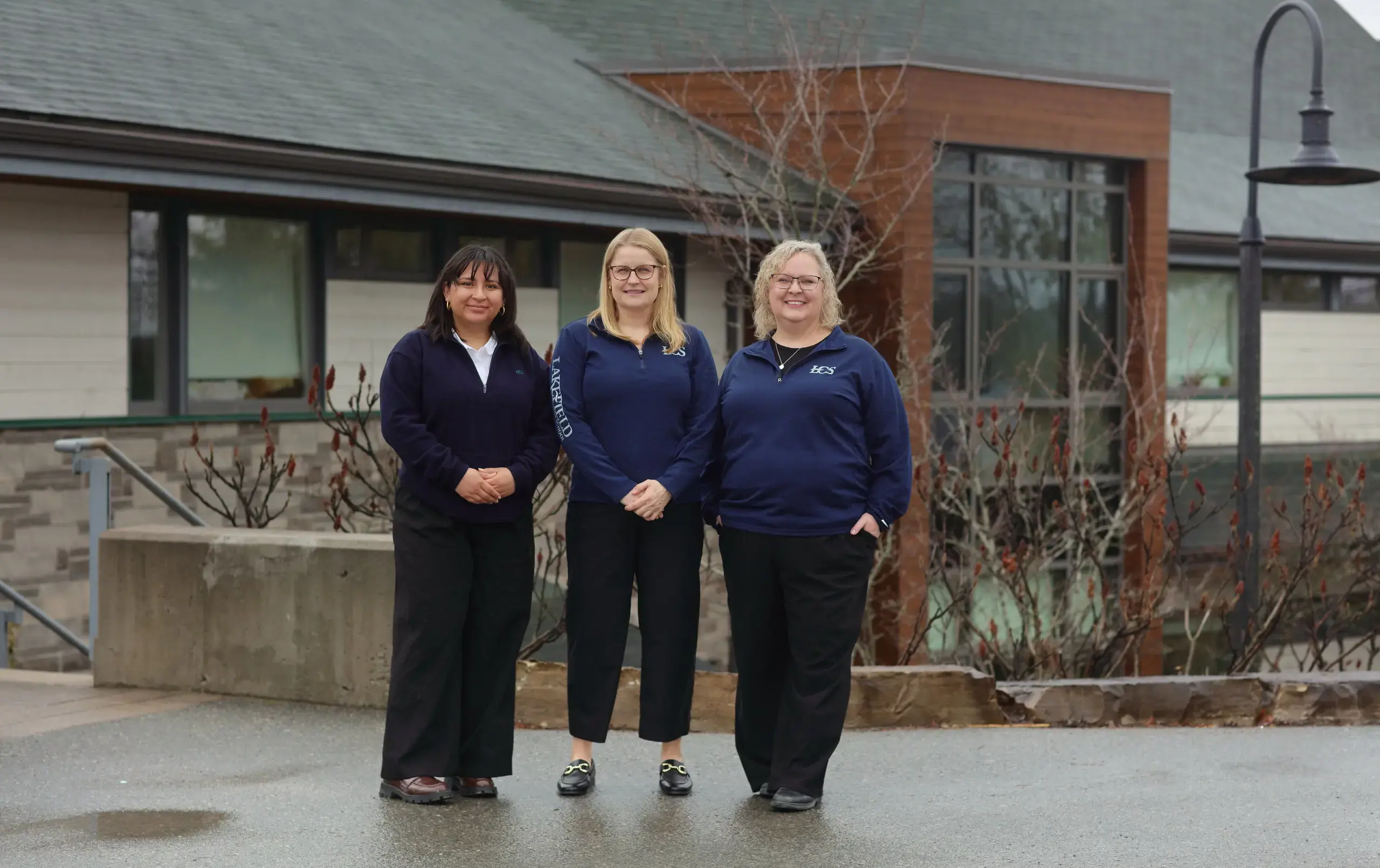 Uplands House team standing outside building