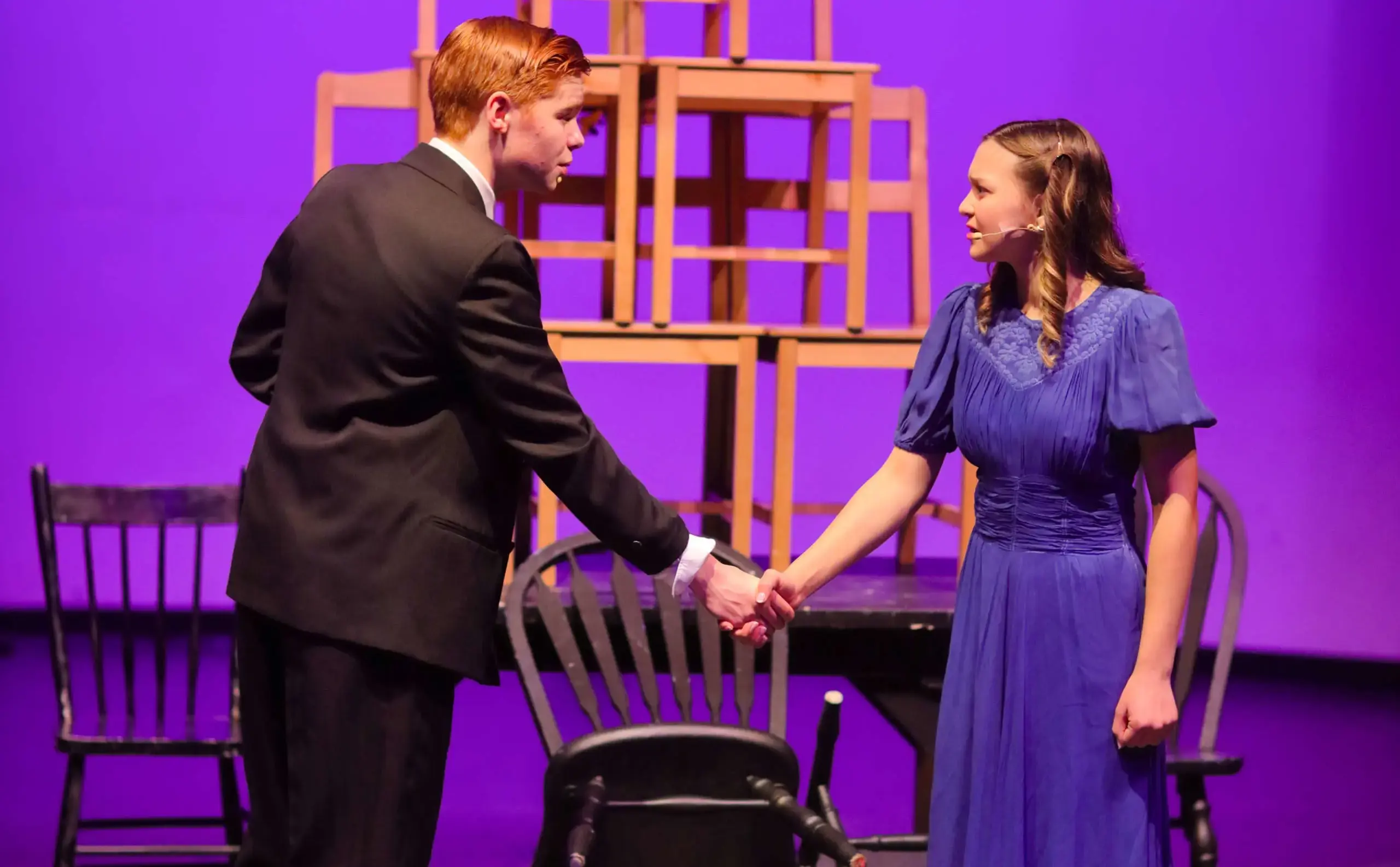 Students performing onstage