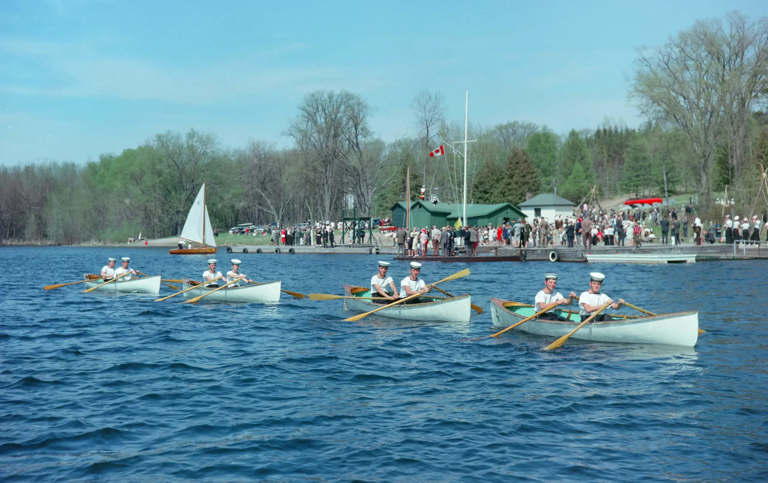 Historical photograph of past Lakefield students at a regatta