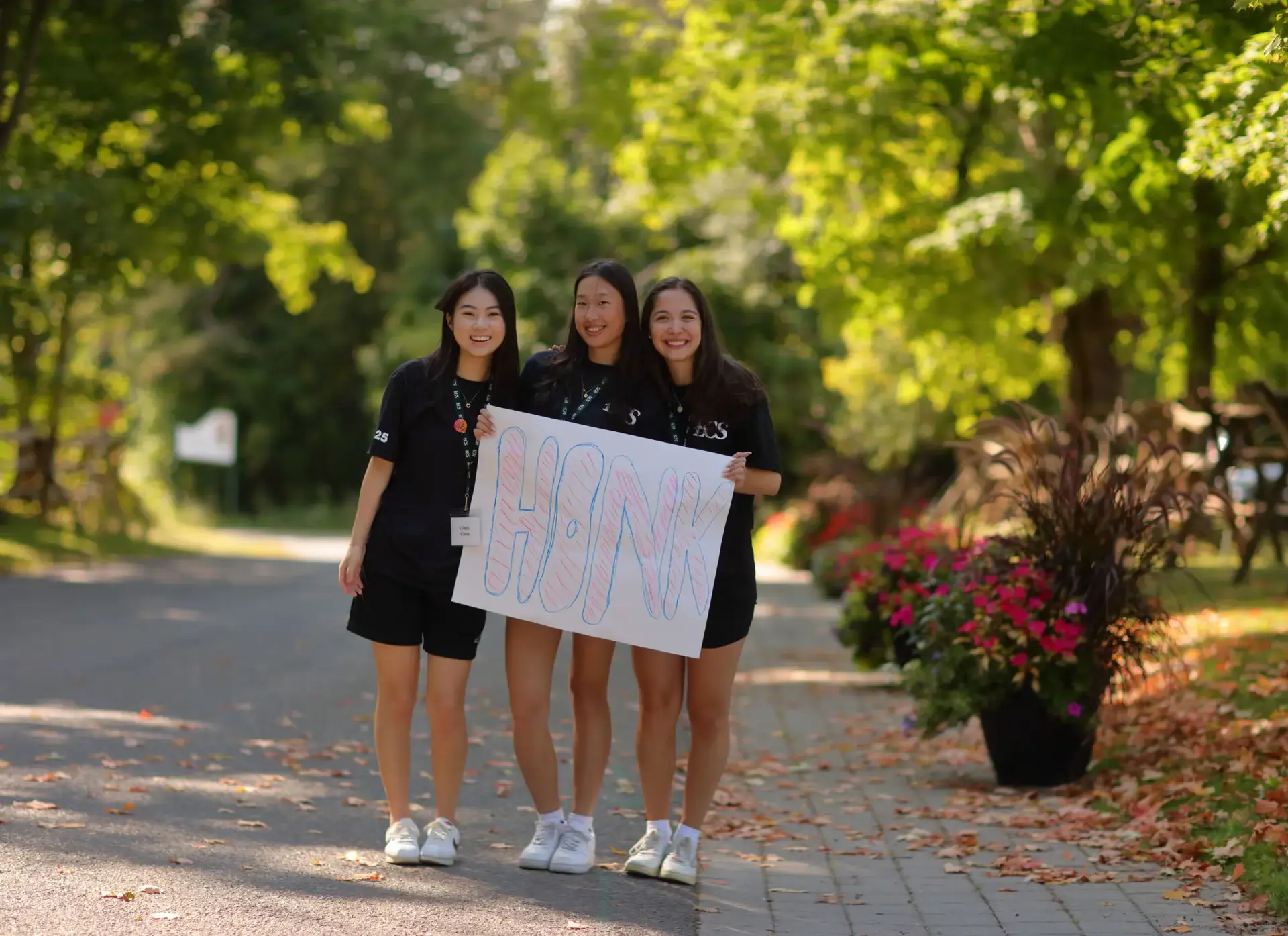 Students holding up banner at welcome event