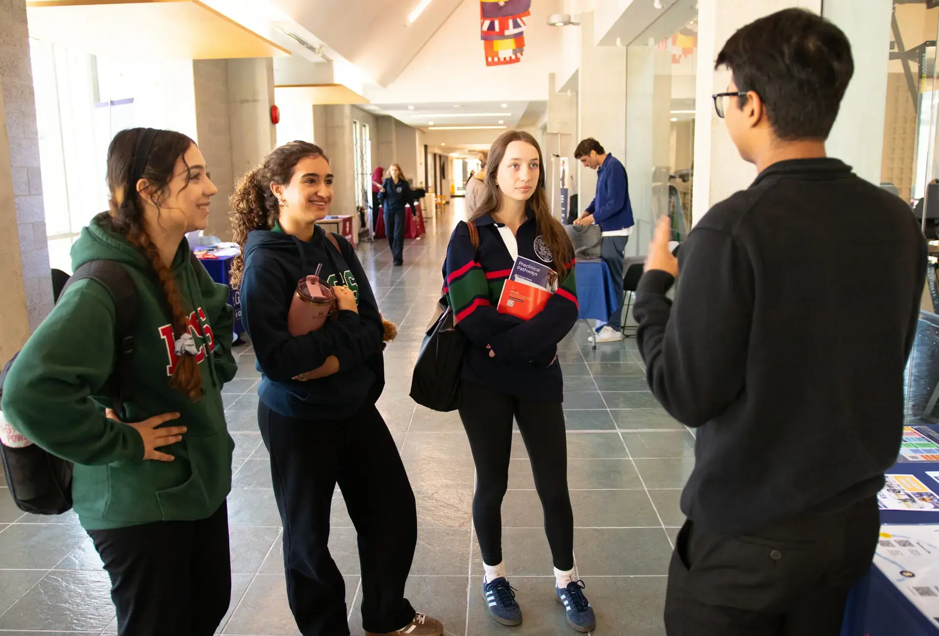 Students chatting in corridor