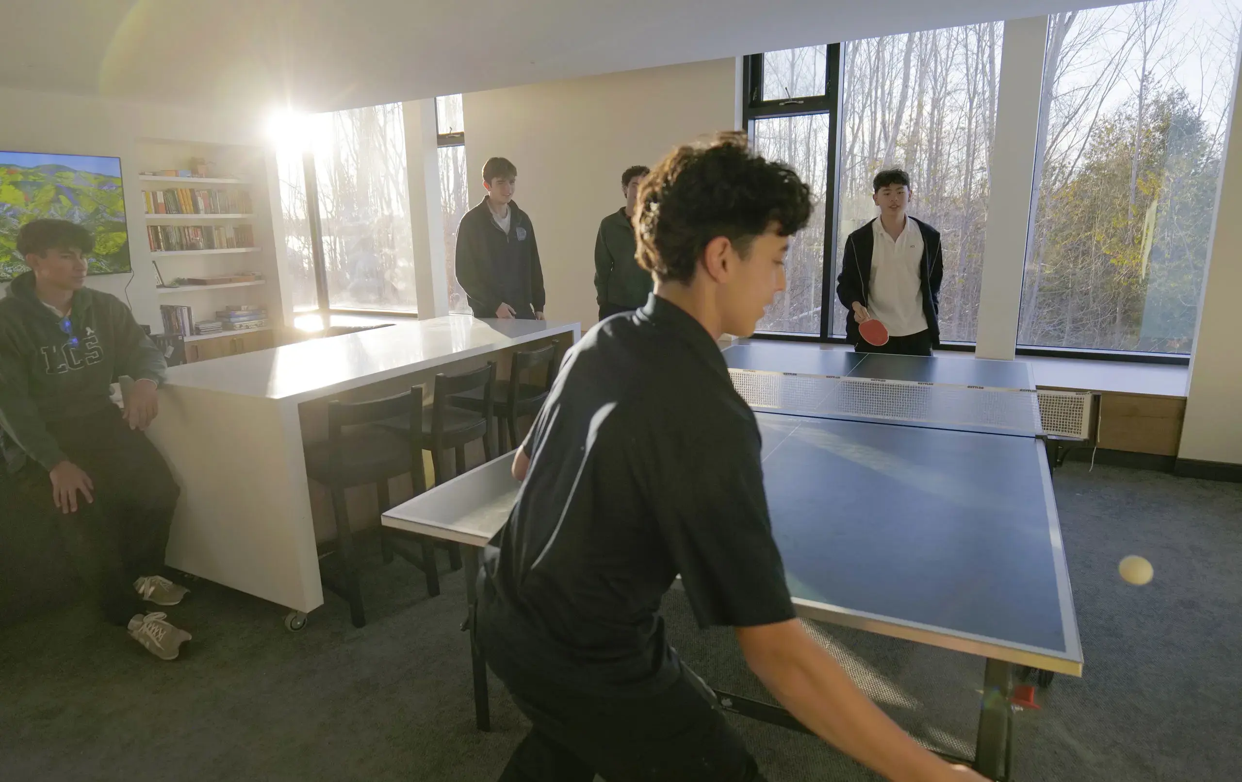 Students playing table tennis